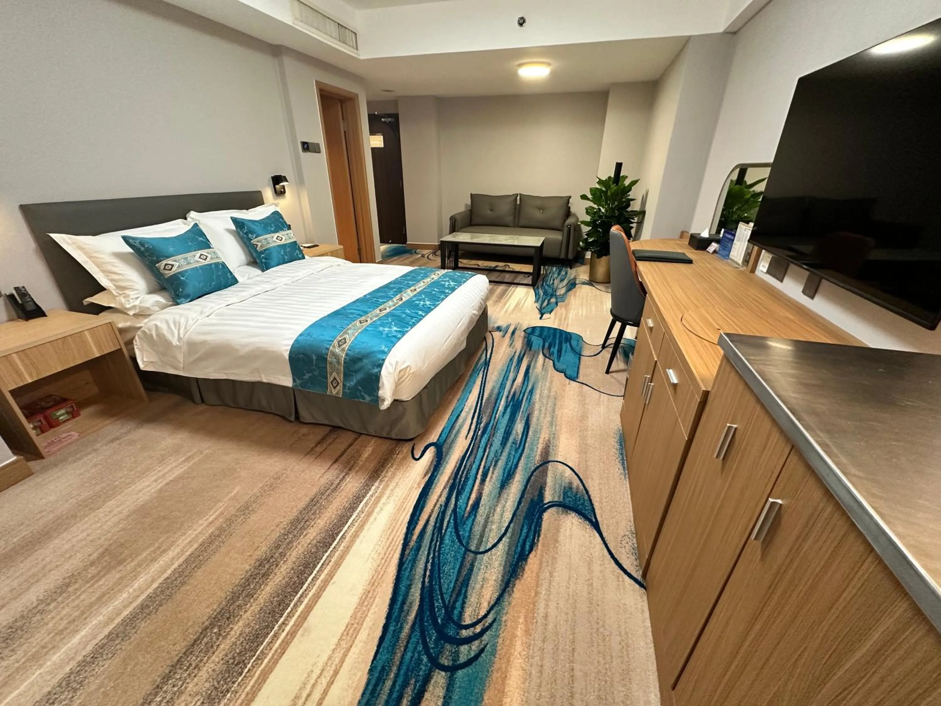 Bed in The North Garden Hotel Beijing Wangfujing