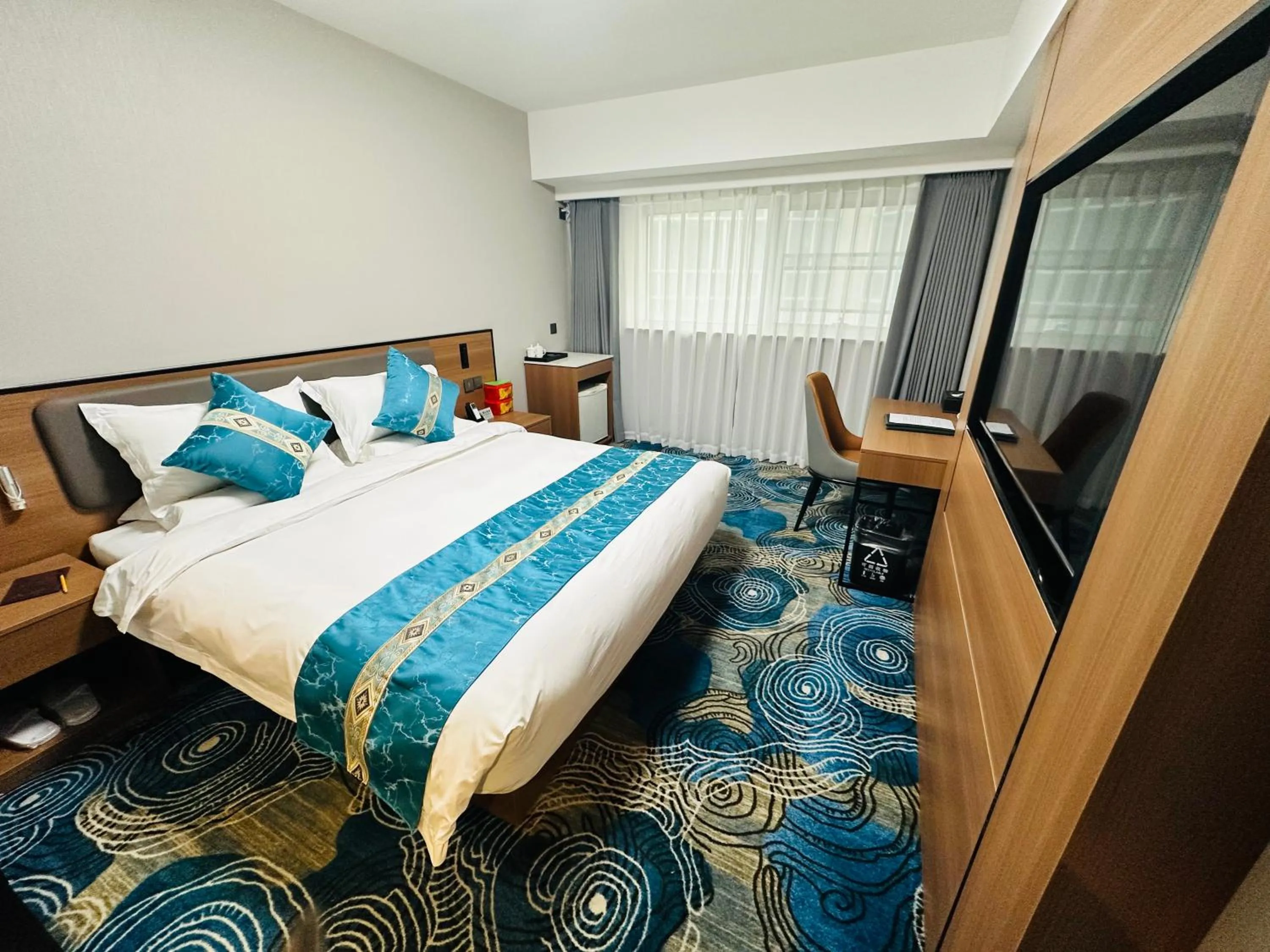 Bed in The North Garden Hotel Beijing Wangfujing