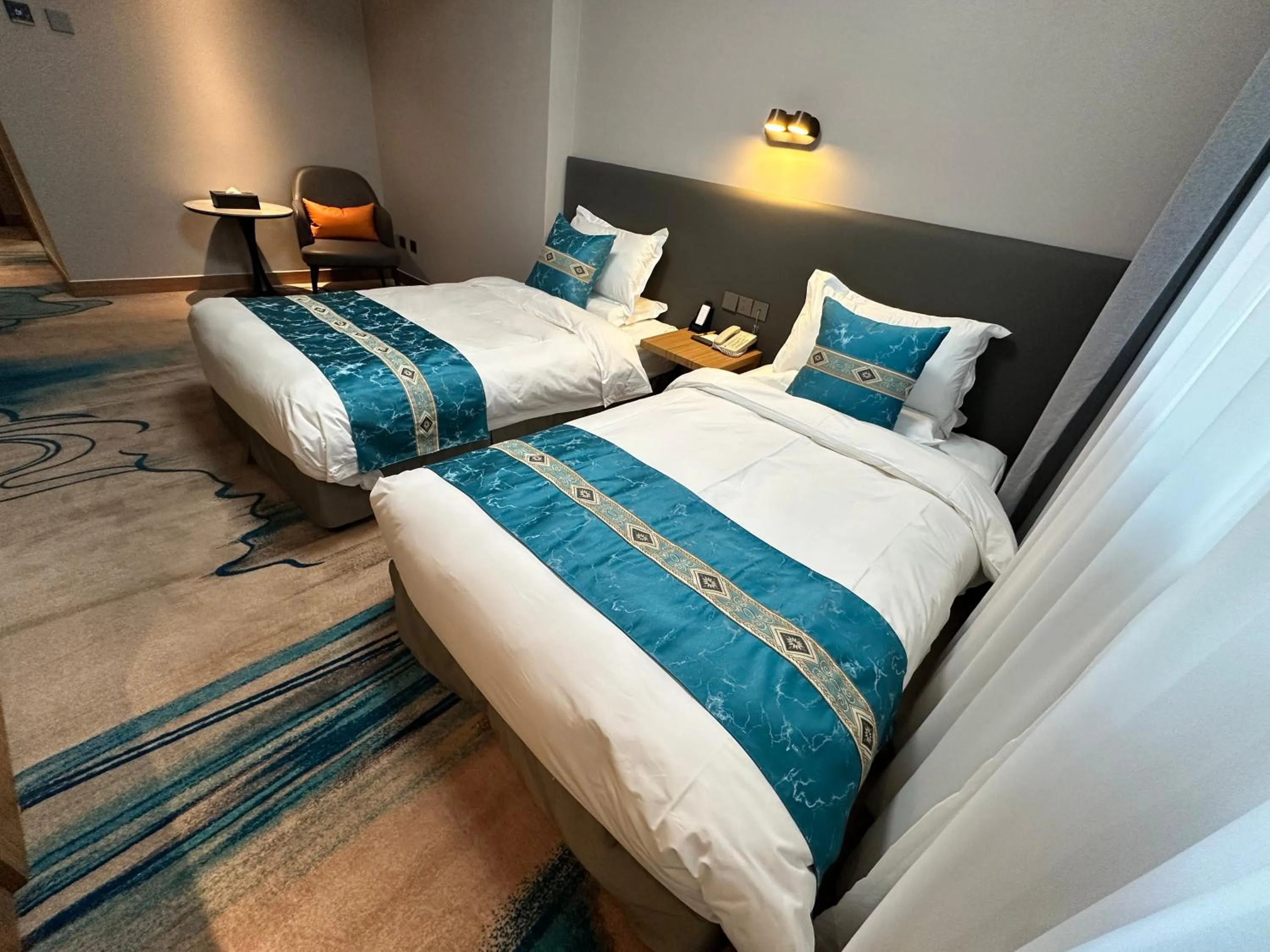 Bed in The North Garden Hotel Beijing Wangfujing