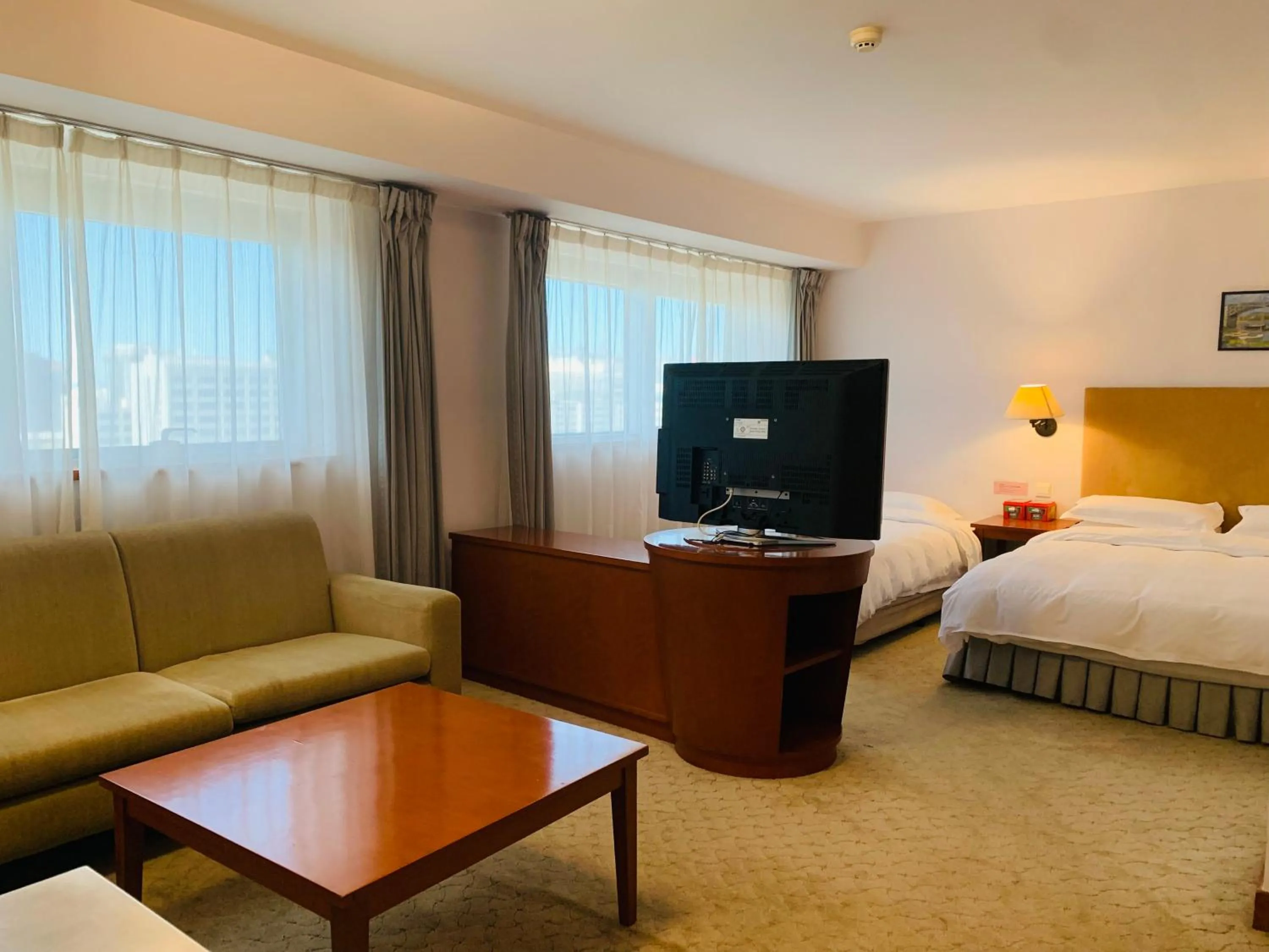 Bed in The North Garden Hotel Beijing Wangfujing