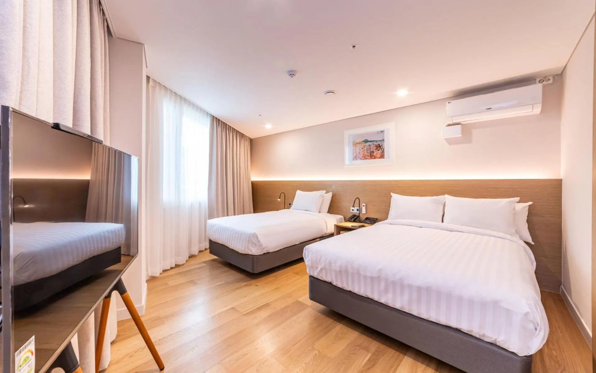 Bed in New Seoul Hotel Myeongdong