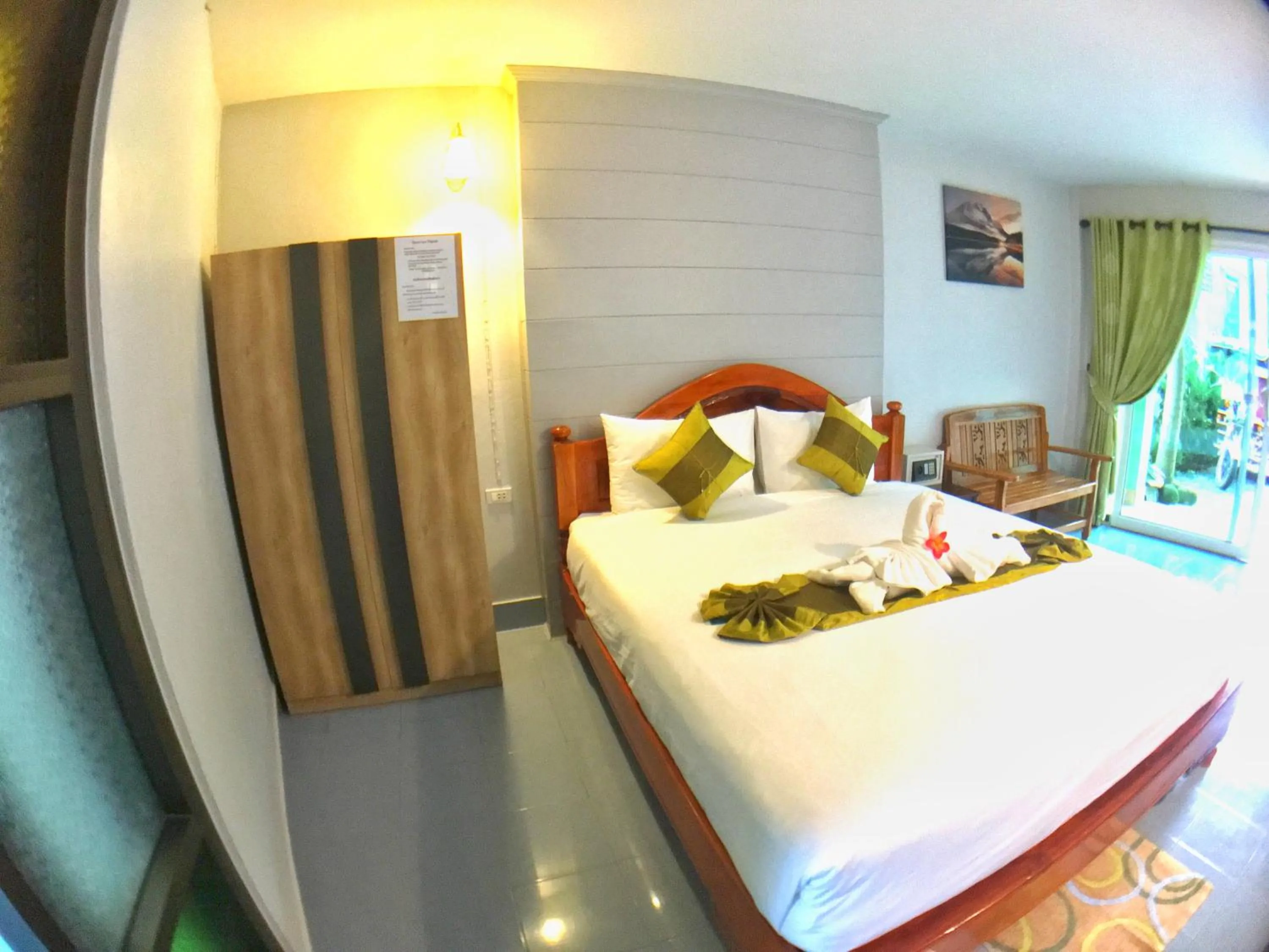Bed in Srichada Hotel Khaolak - SHA Extra Plus