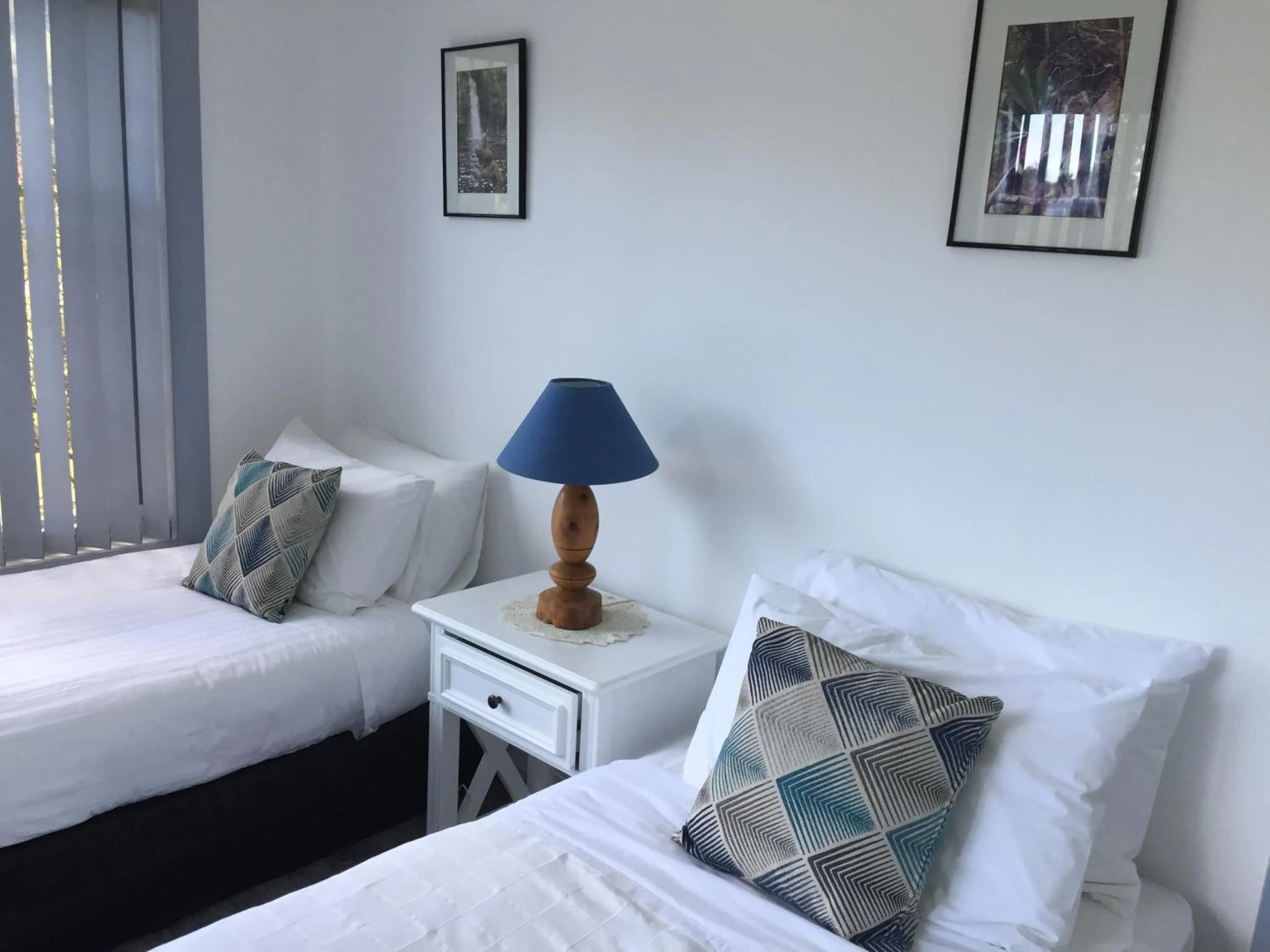 Bed in Regatta Point Tavern & Holiday Villas