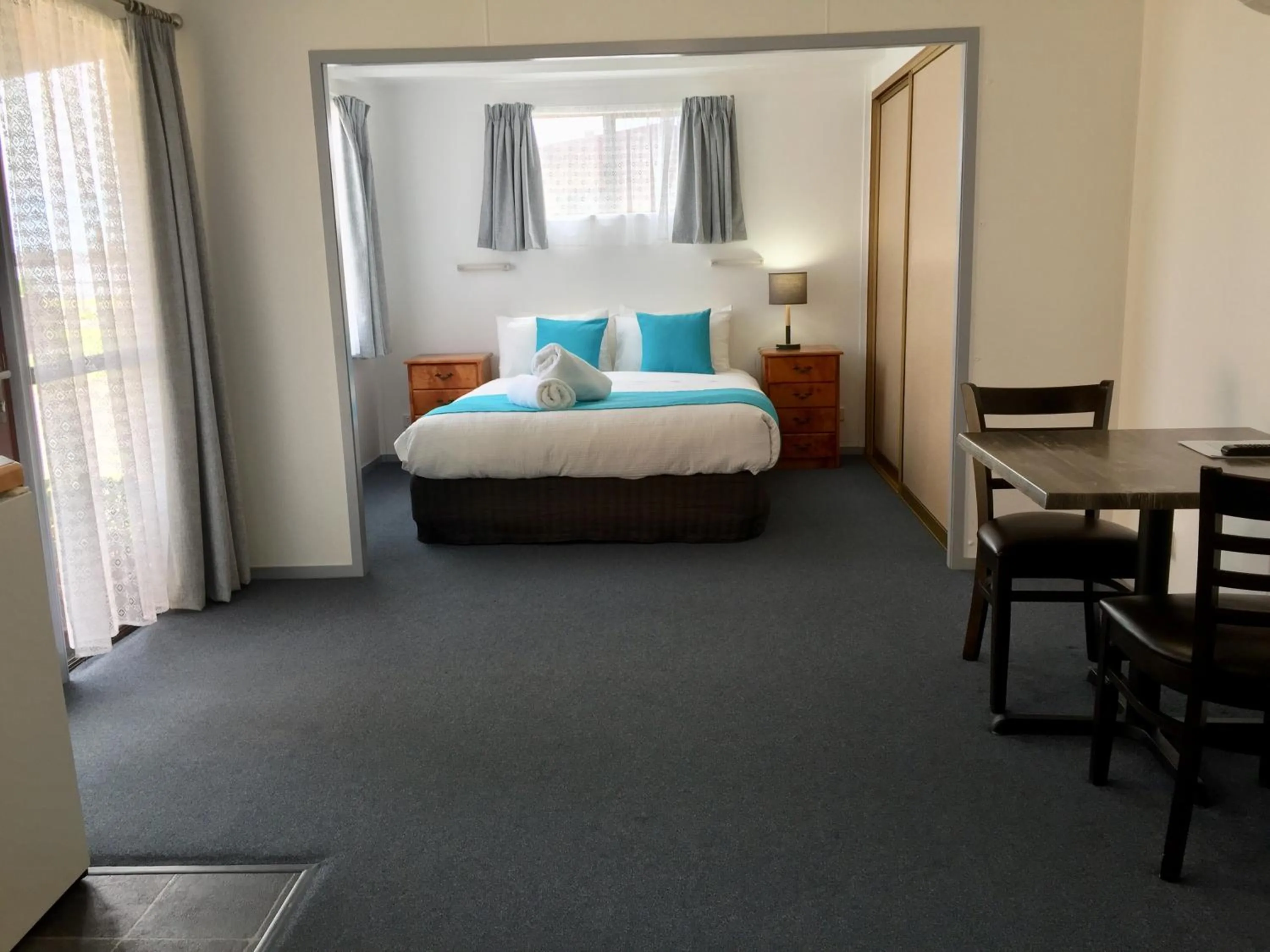 Bed in Regatta Point Tavern & Holiday Villas