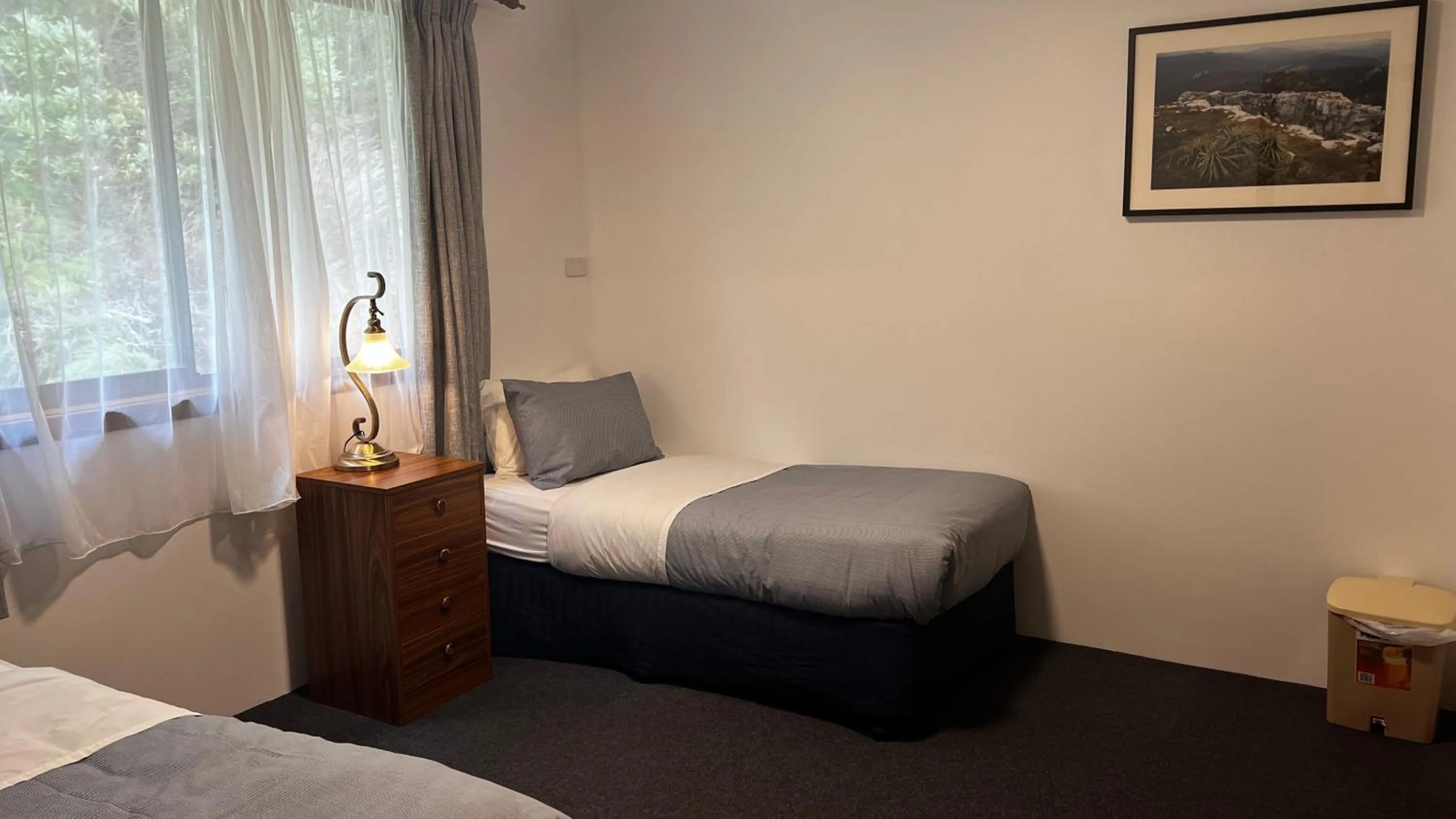 Bed in Regatta Point Tavern & Holiday Villas