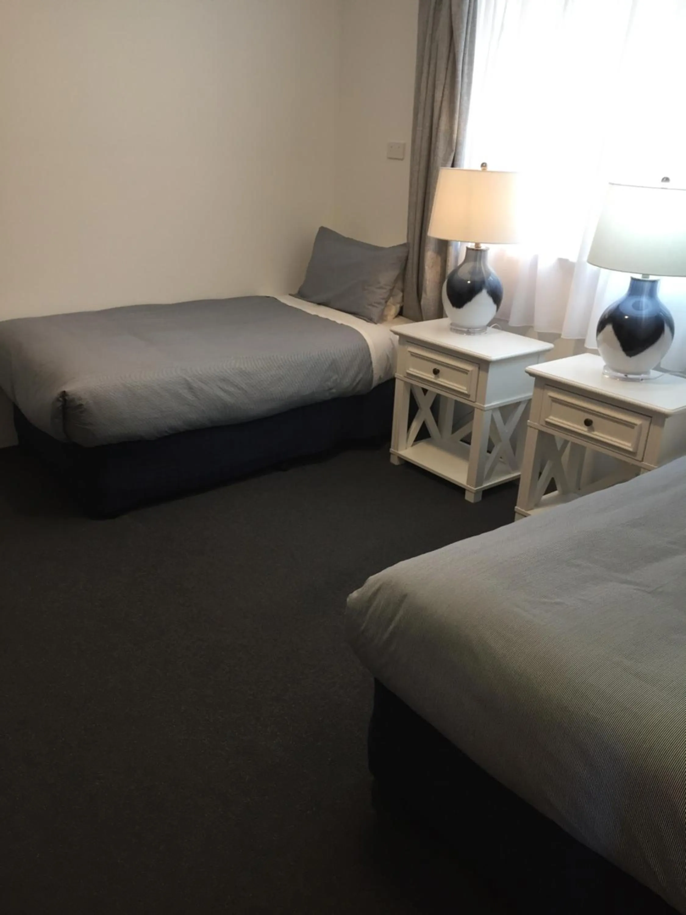 Bed in Regatta Point Tavern & Holiday Villas