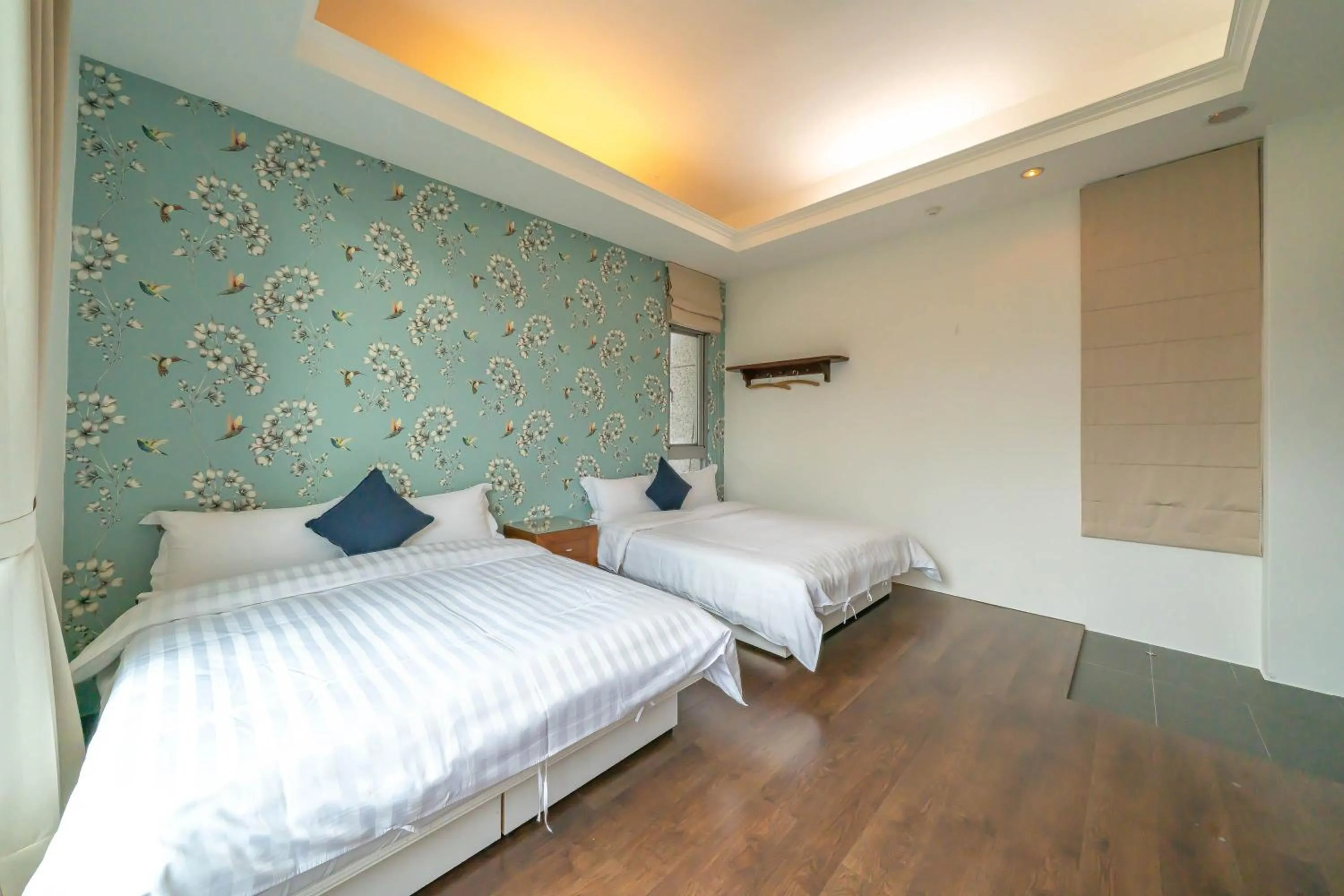 Bed in 美麗晨曦民宿-附停車位 近慈濟