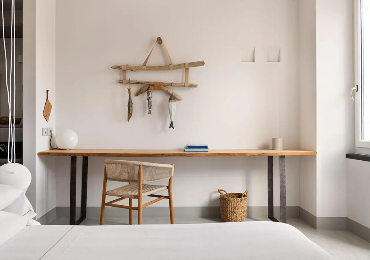 Bed in LA GUARDIA Hotel