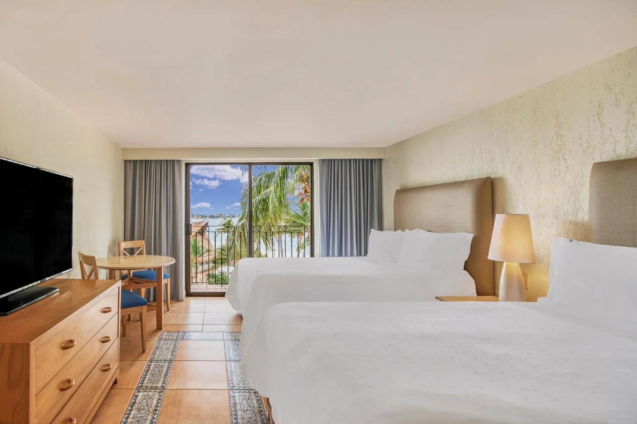 Photo of the whole room, Bed in Fiesta Americana Cancun Villas