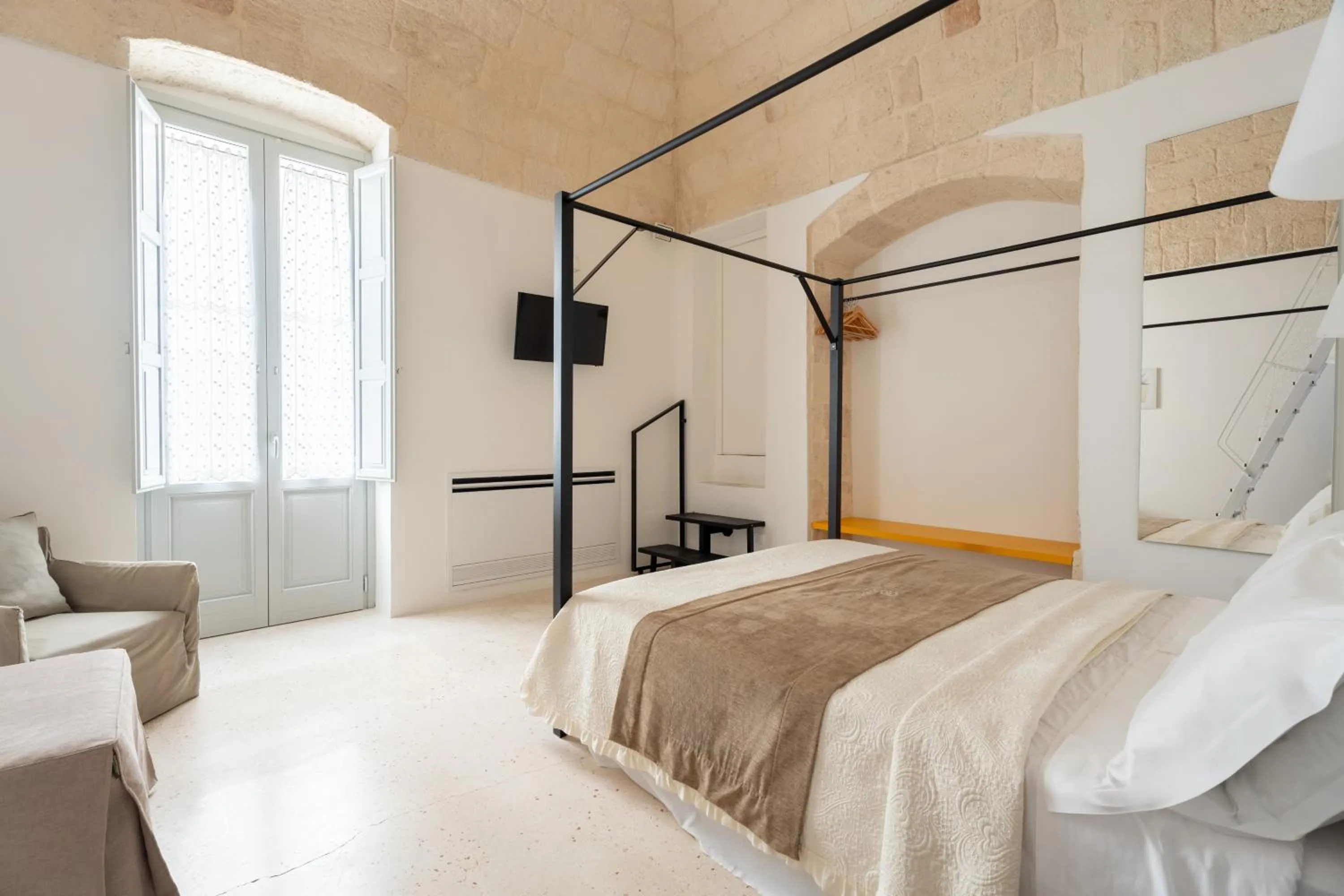 Bed in Donna Domenica Boutique Suites