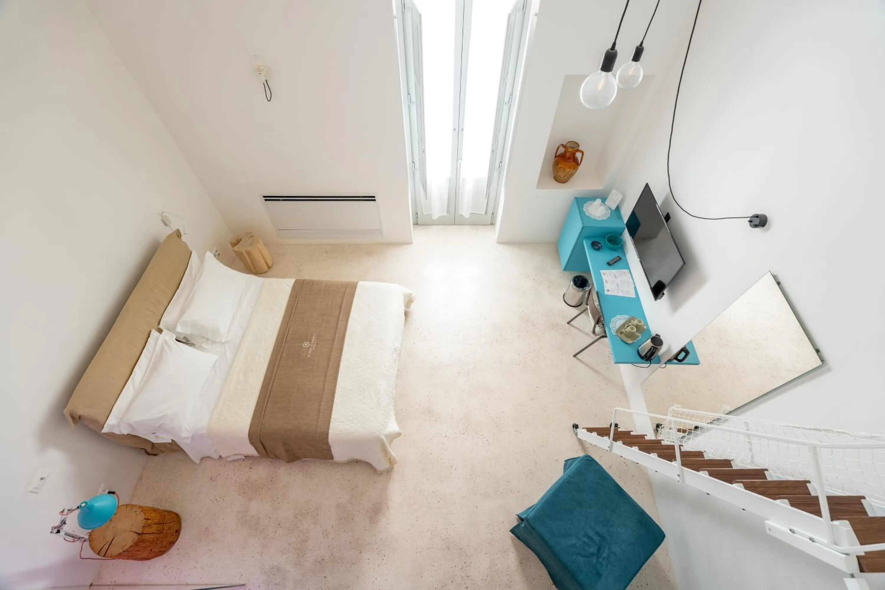 Bed in Donna Domenica Boutique Suites