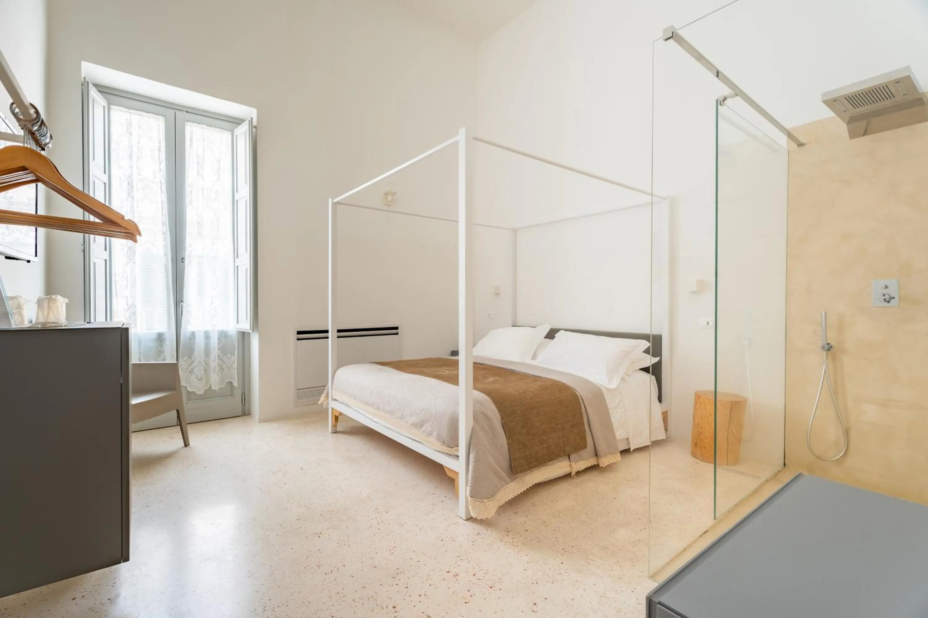 Bed in Donna Domenica Boutique Suites