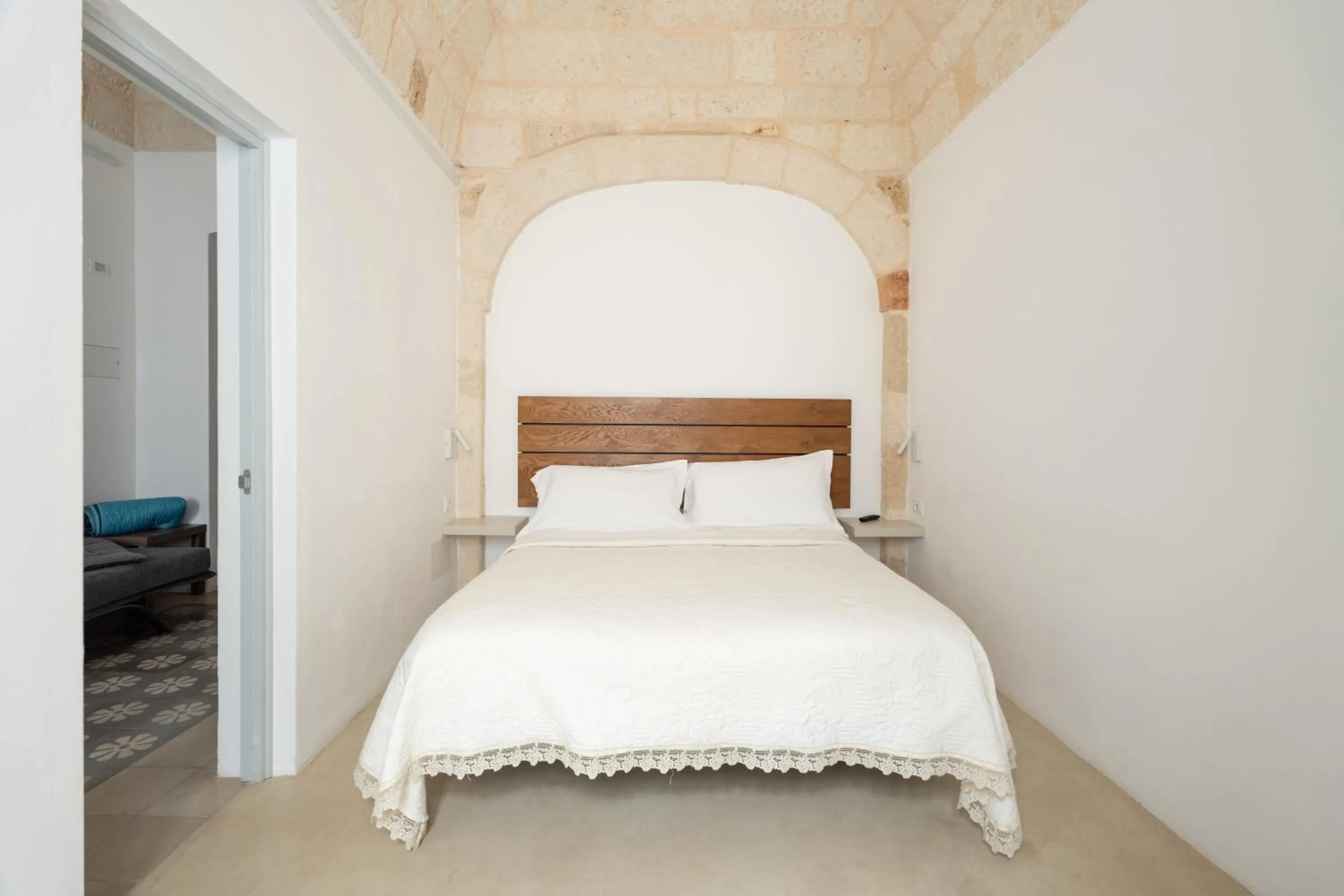 Bed in Donna Domenica Boutique Suites