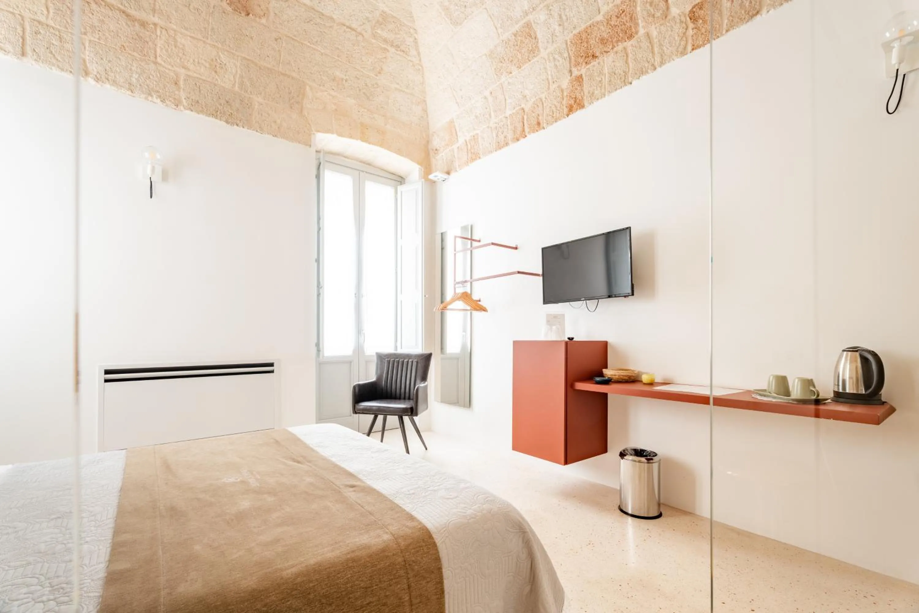 Bed in Donna Domenica Boutique Suites