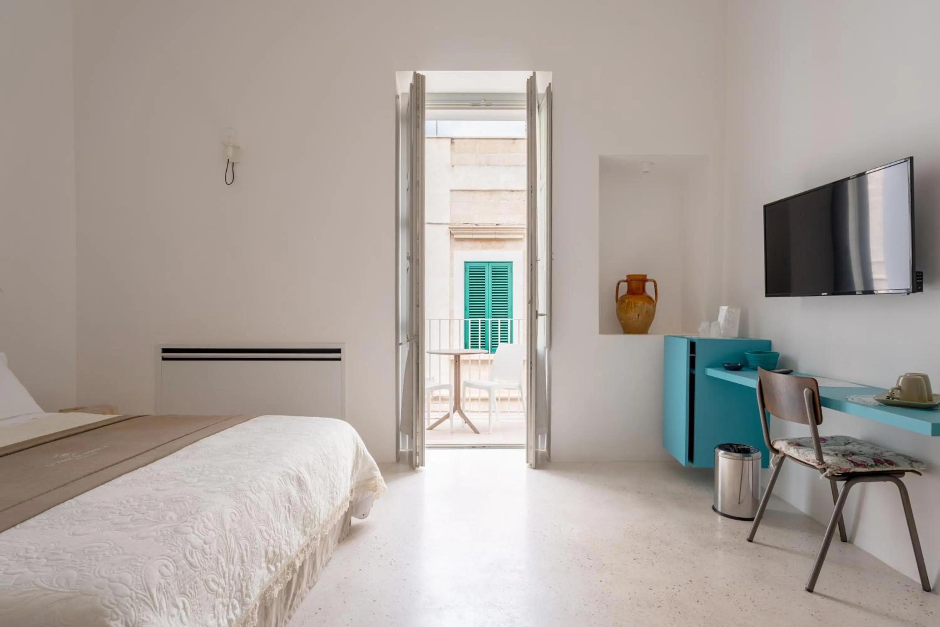 Bed in Donna Domenica Boutique Suites