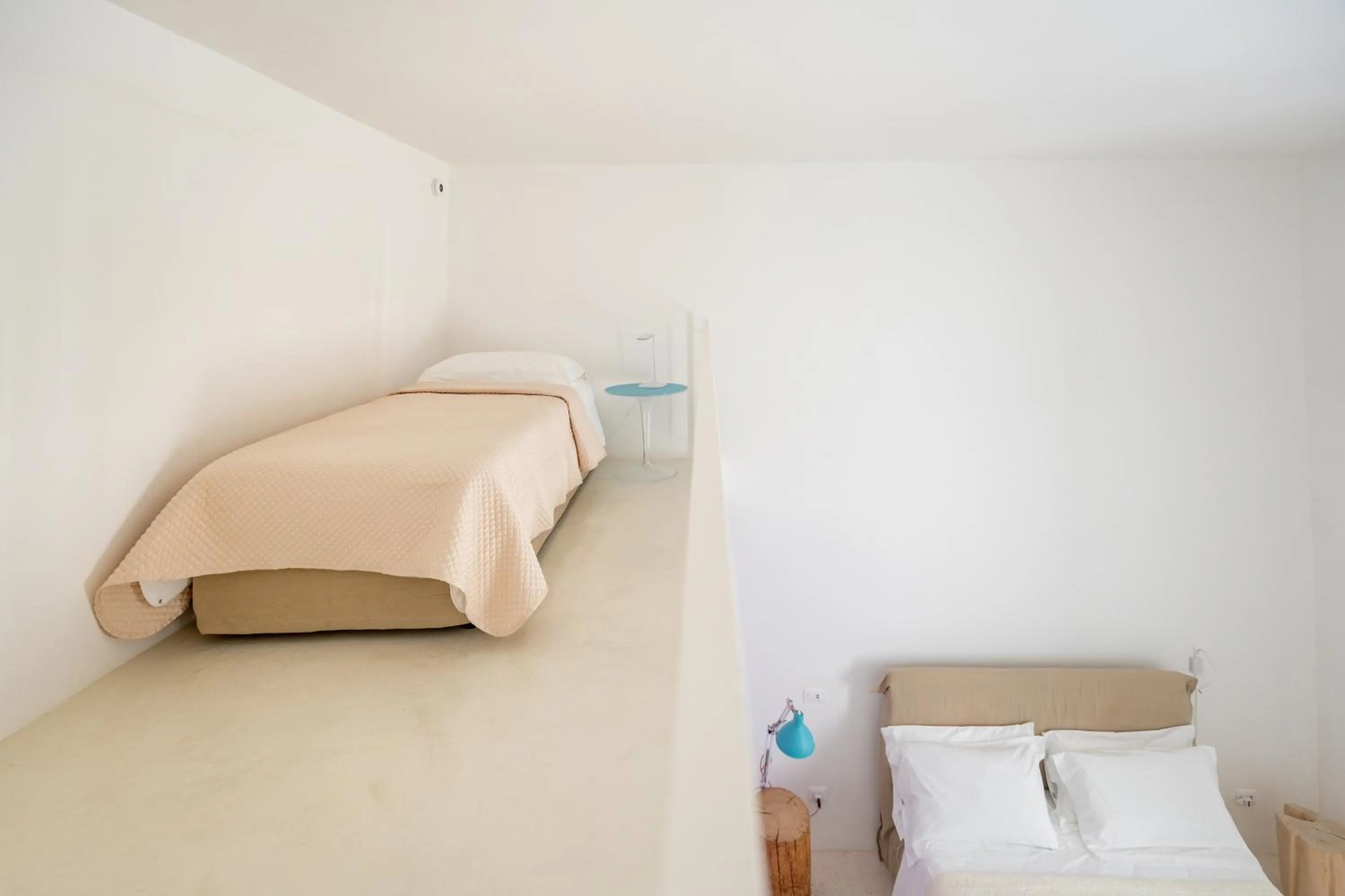 Bed in Donna Domenica Boutique Suites