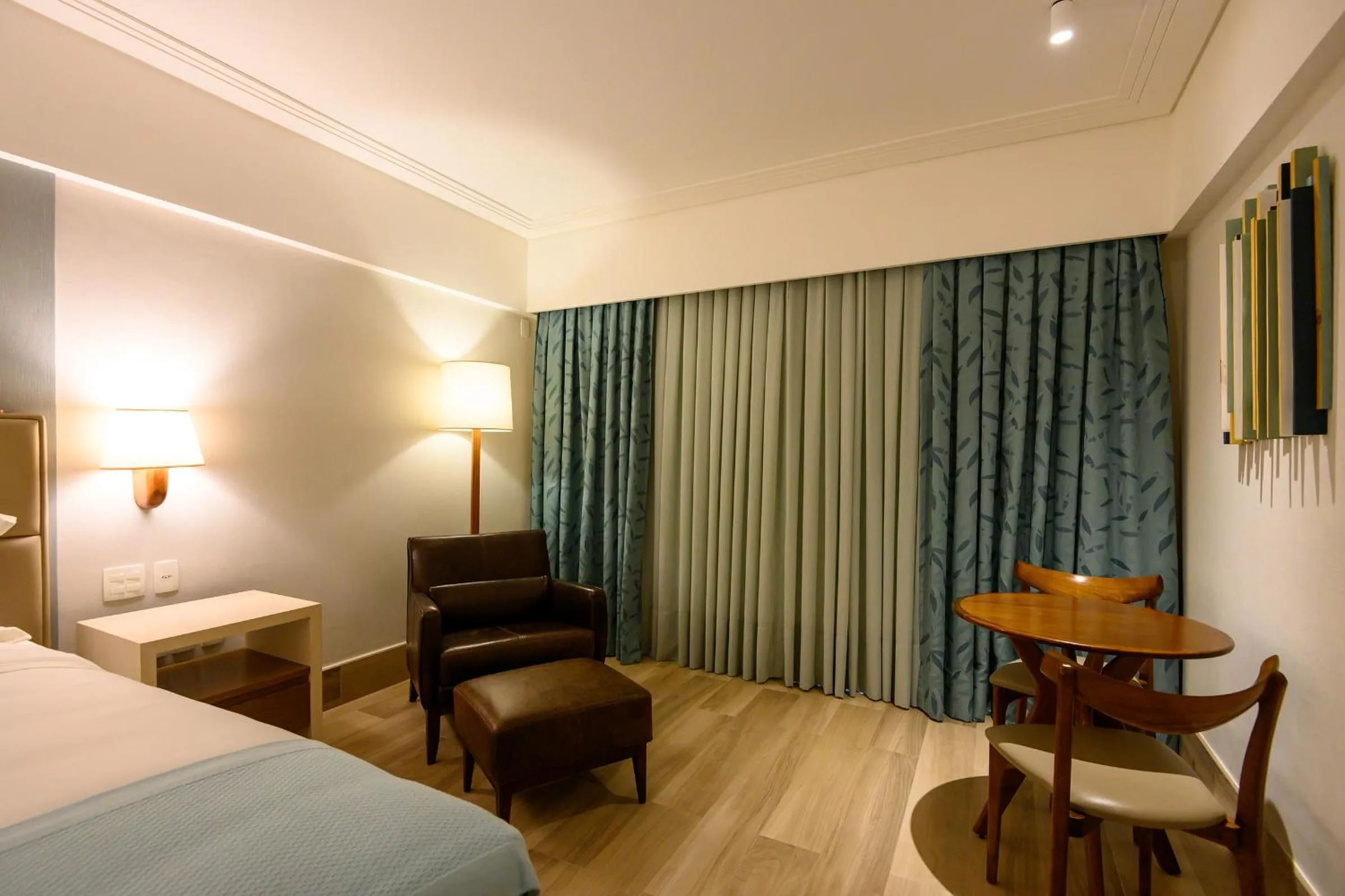 Bed in Vogal Luxury Beach Hotel & SPA