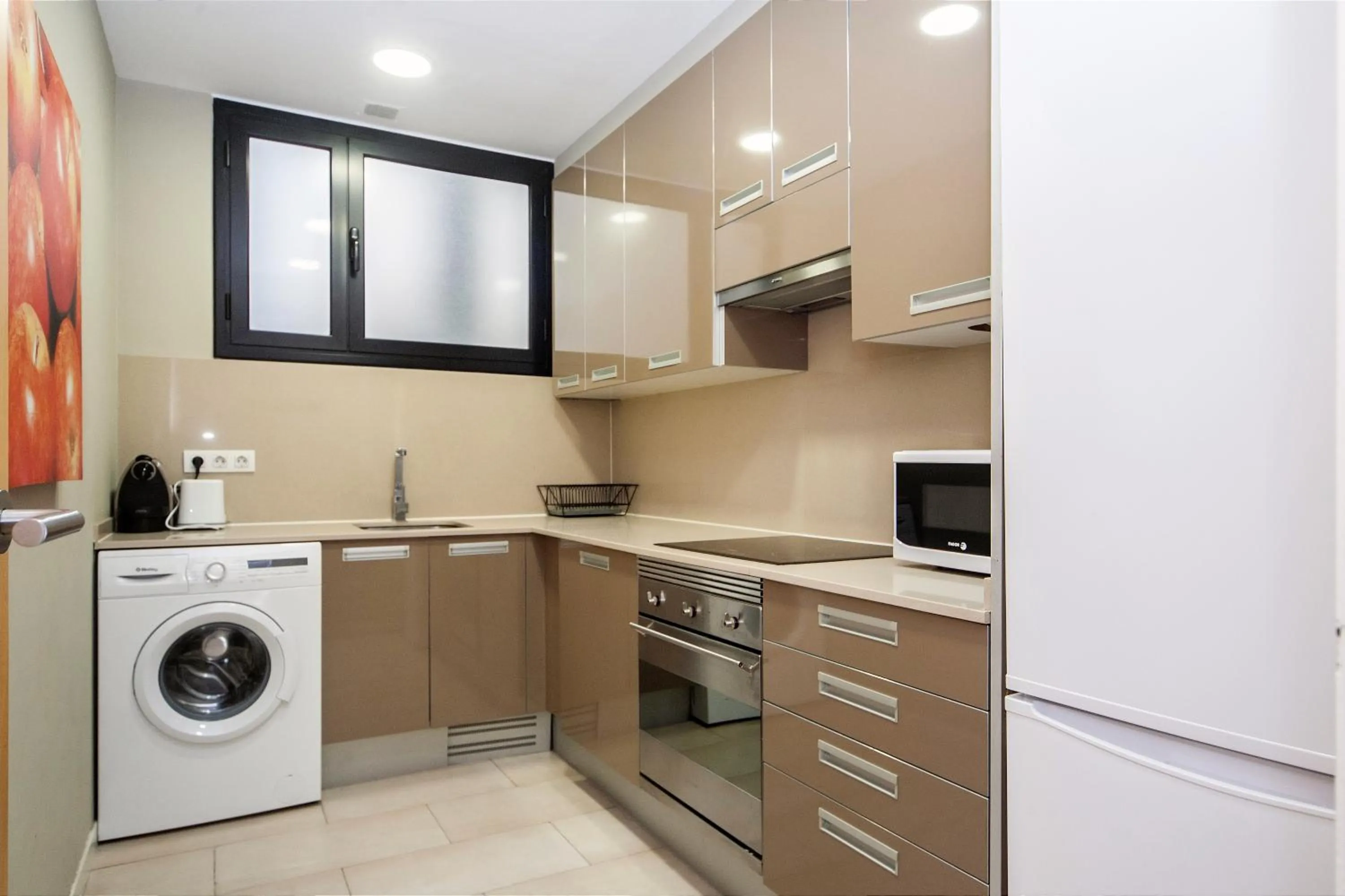 Kitchen or kitchenette in MH Apartments Sant Pau