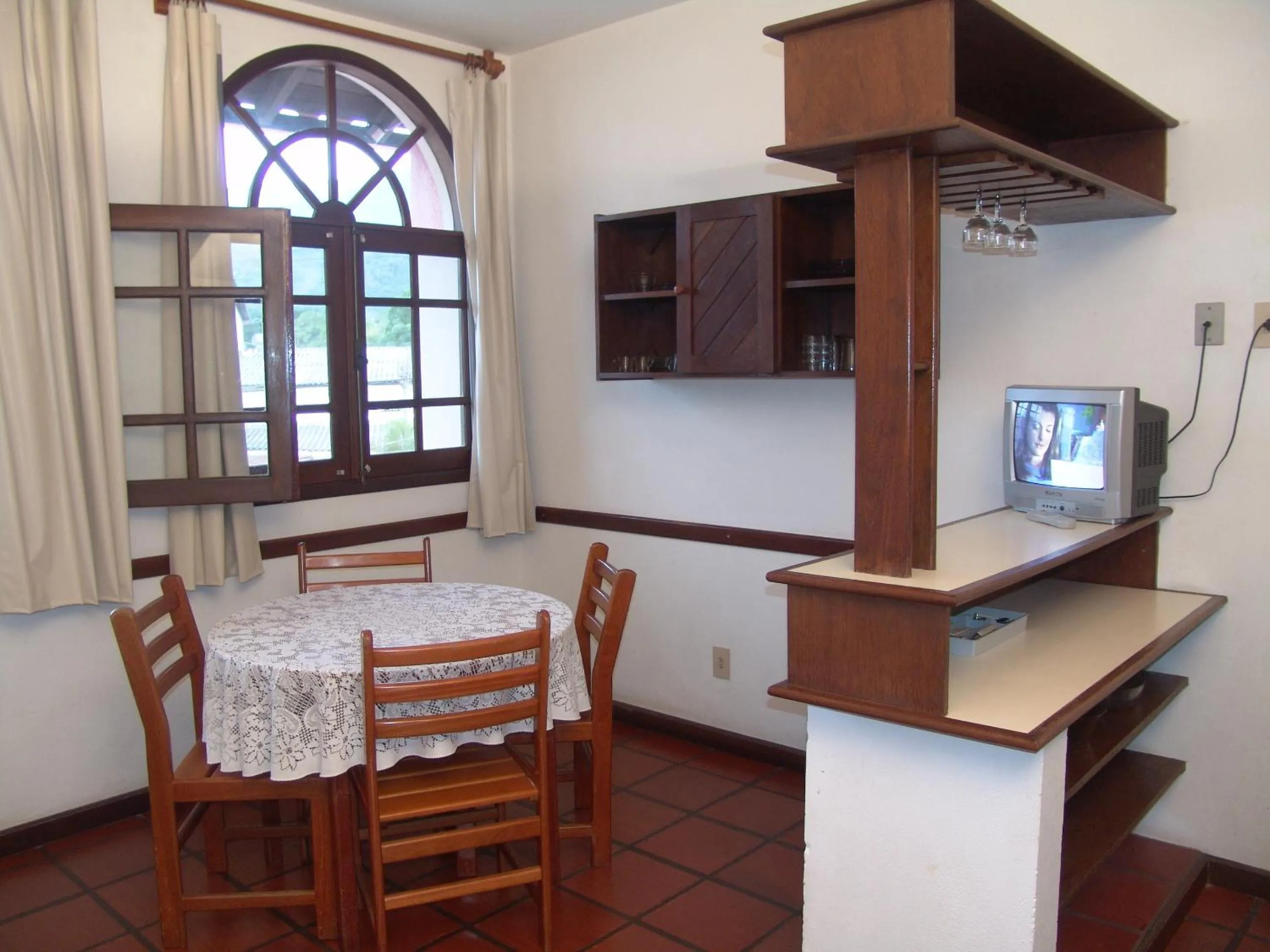 Kitchen or kitchenette in La Alhambra Apart Hotel