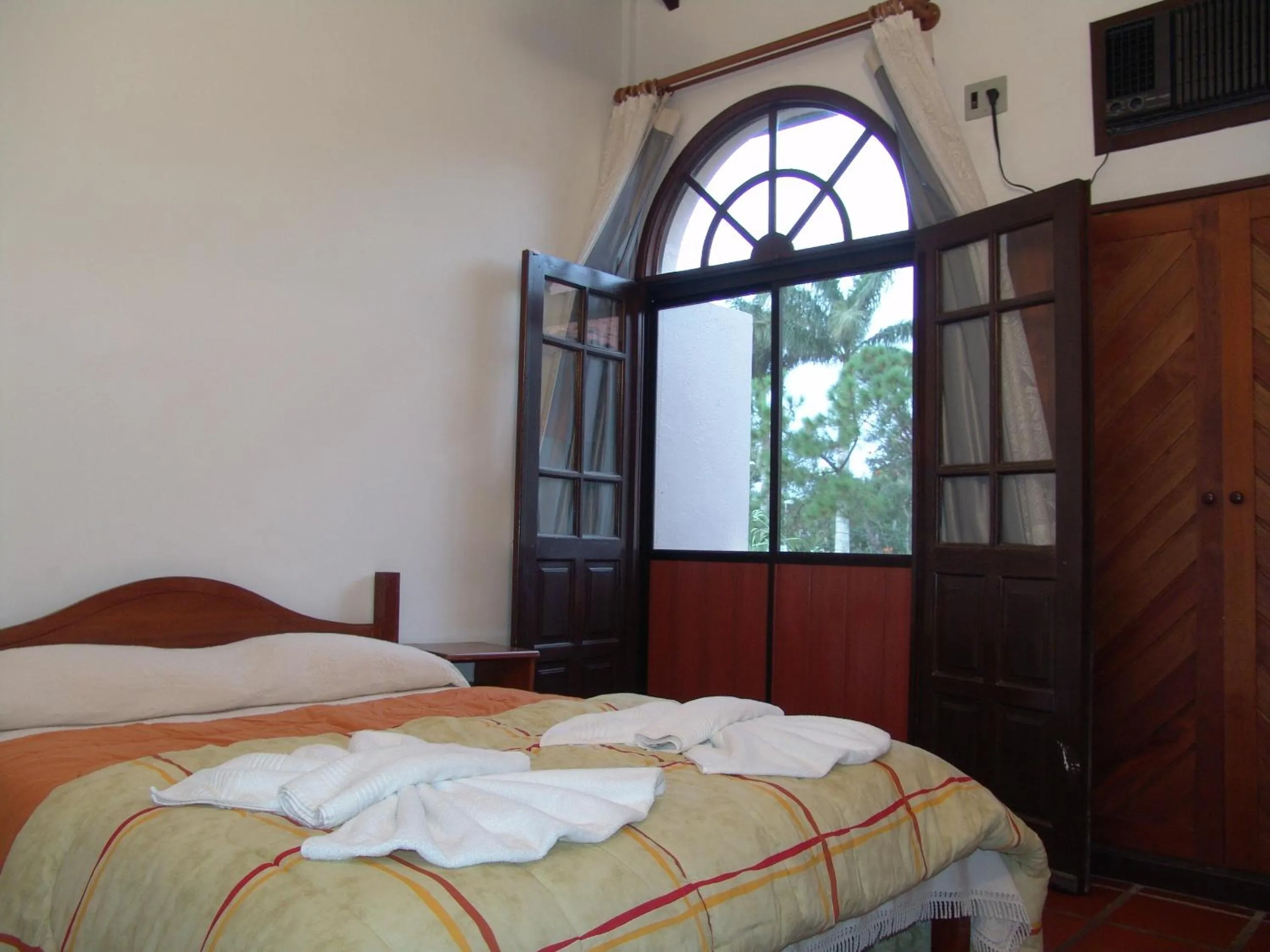 Bed in La Alhambra Apart Hotel