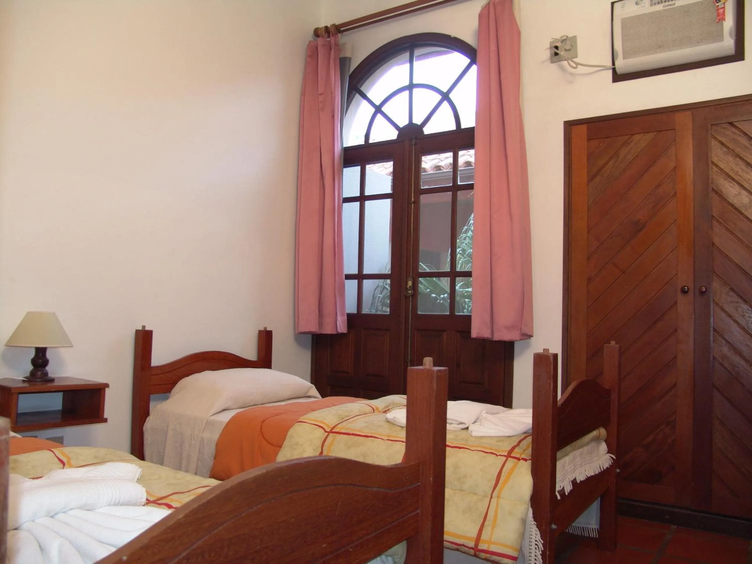 Bed in La Alhambra Apart Hotel