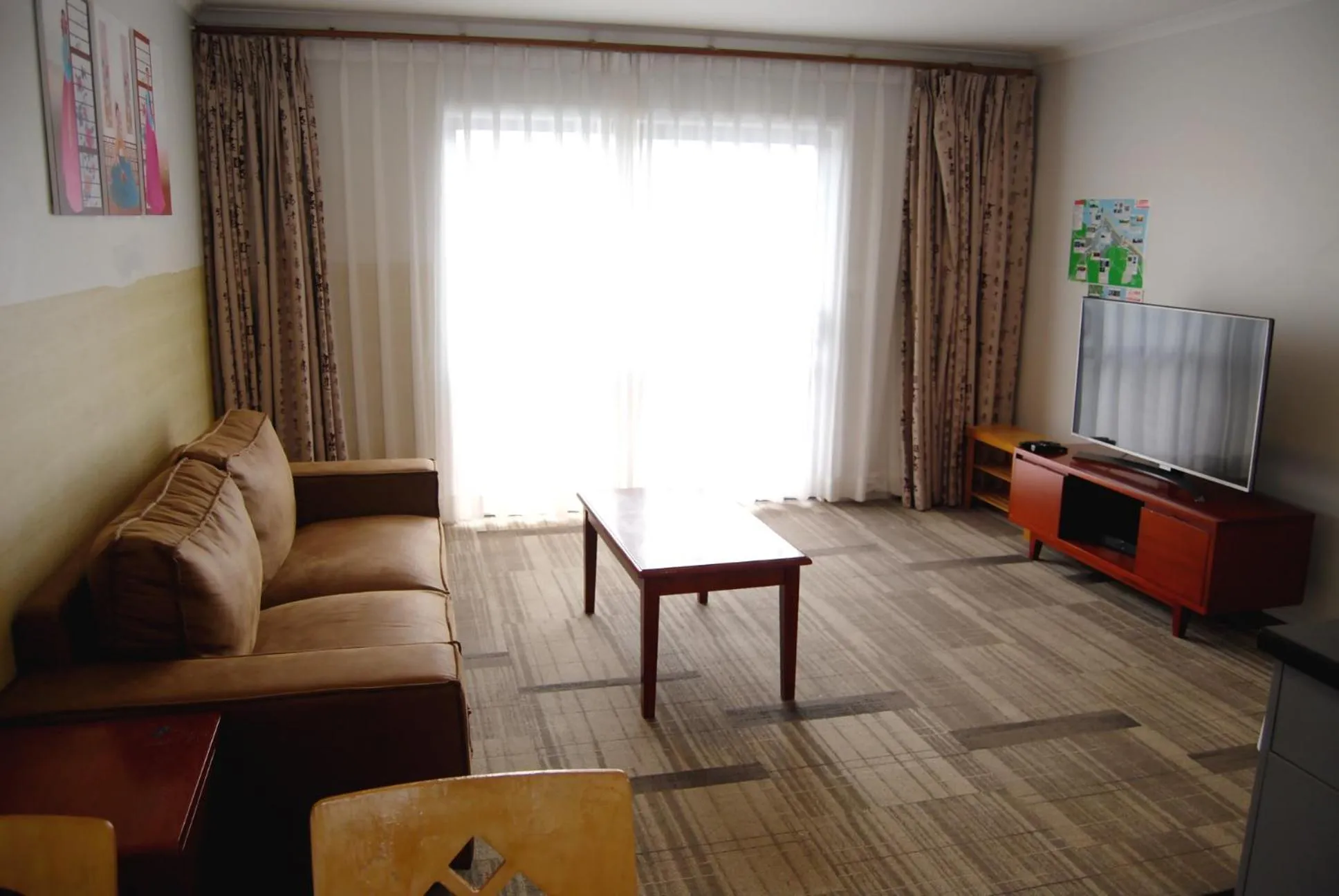 Living room in Energy Motor Lodge Papamoa