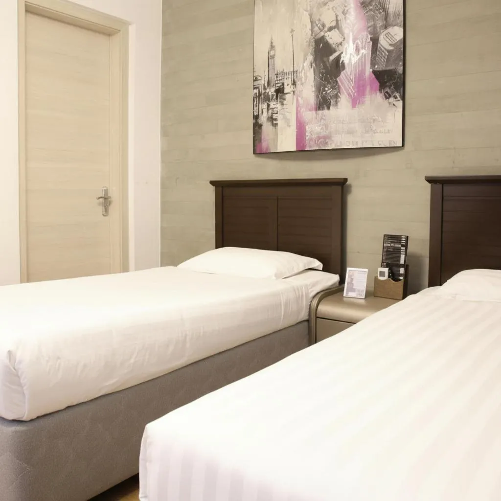 Bed in Hotel Boutique Holitel