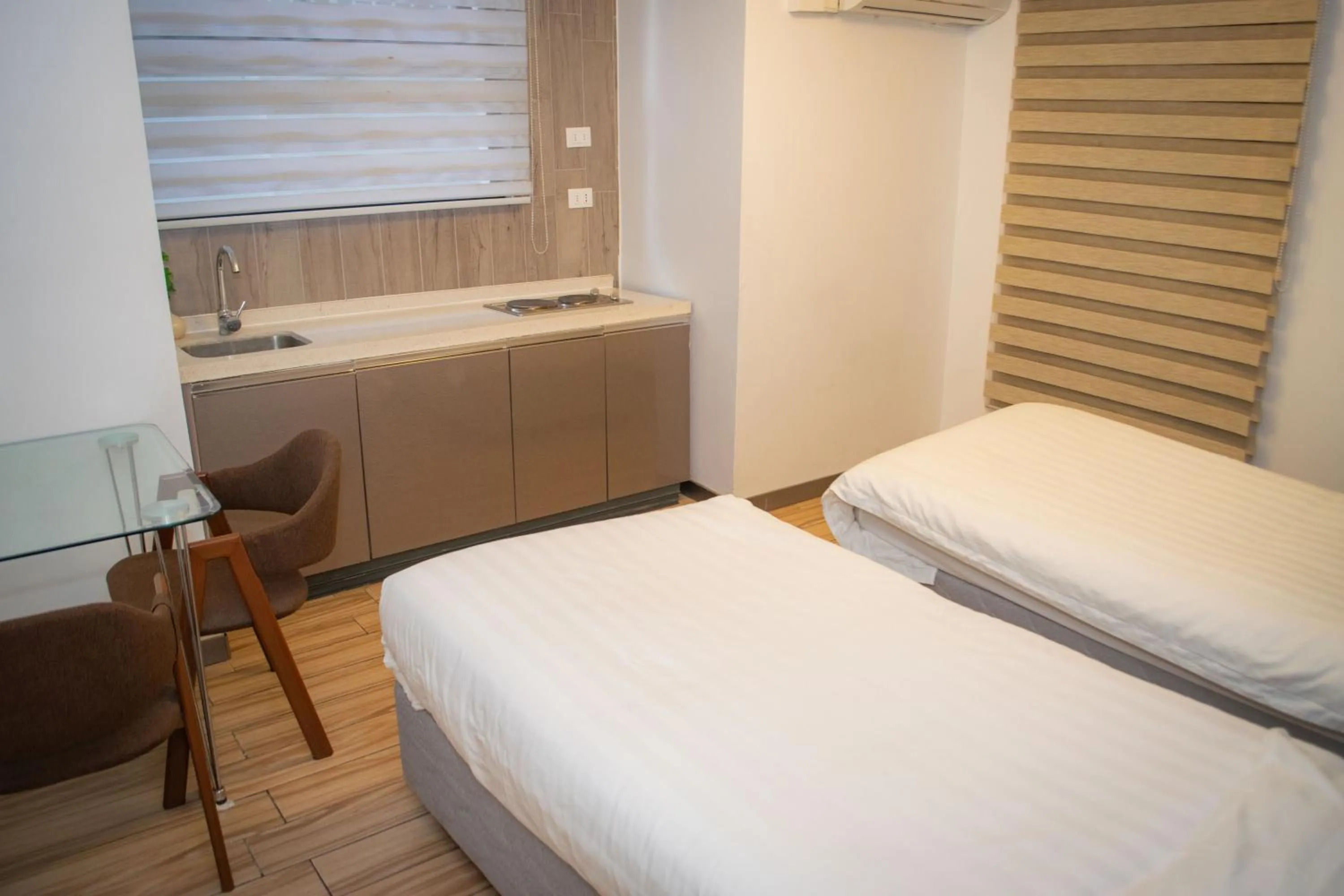 Bed in Hotel Boutique Holitel