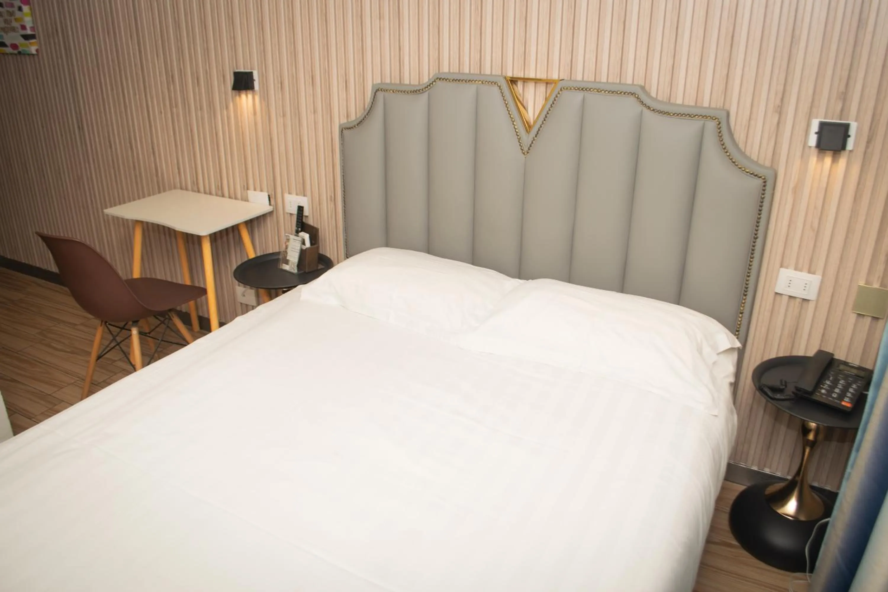 Bed in Hotel Boutique Holitel