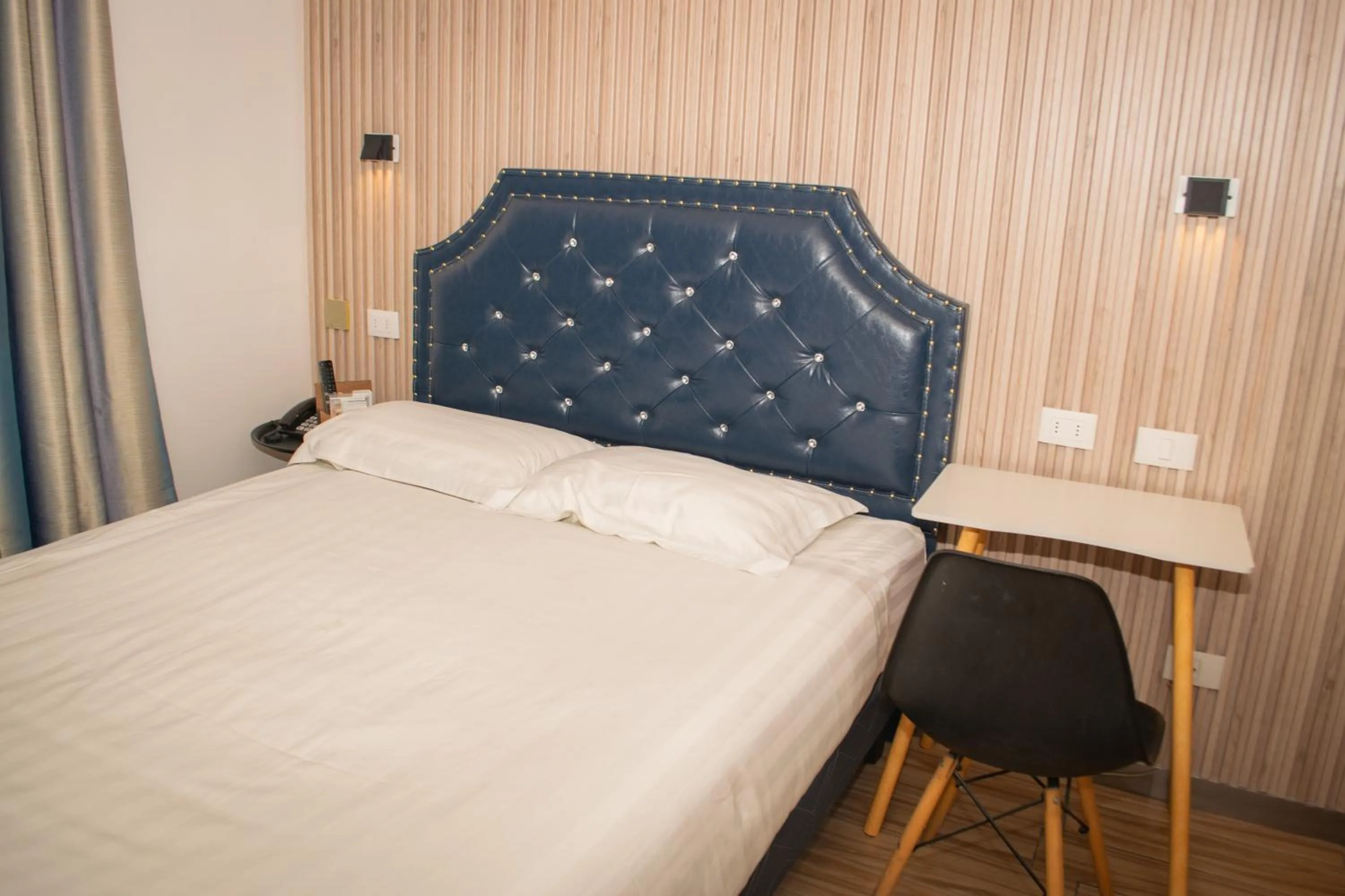 Bed in Hotel Boutique Holitel