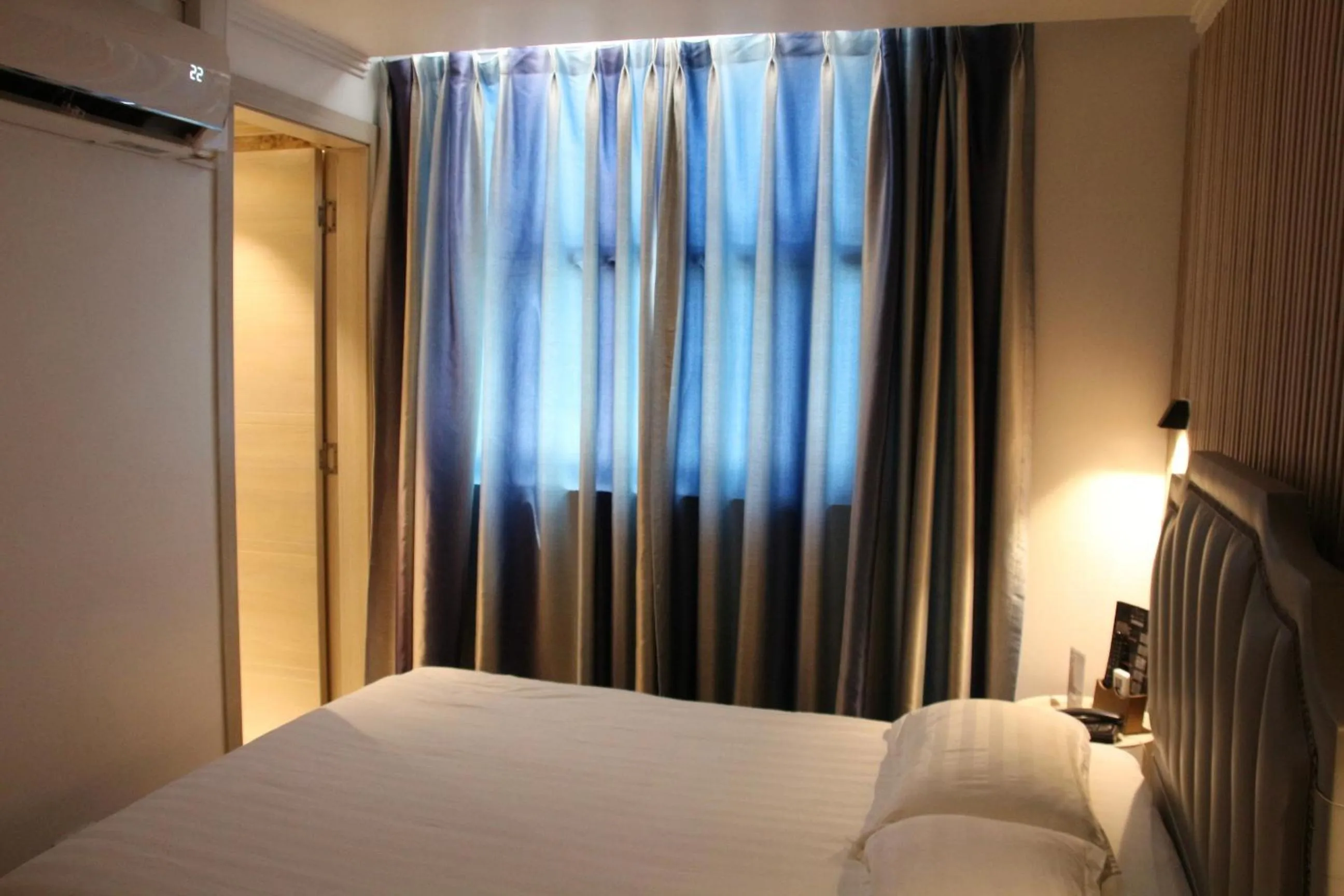 Bed in Hotel Boutique Holitel