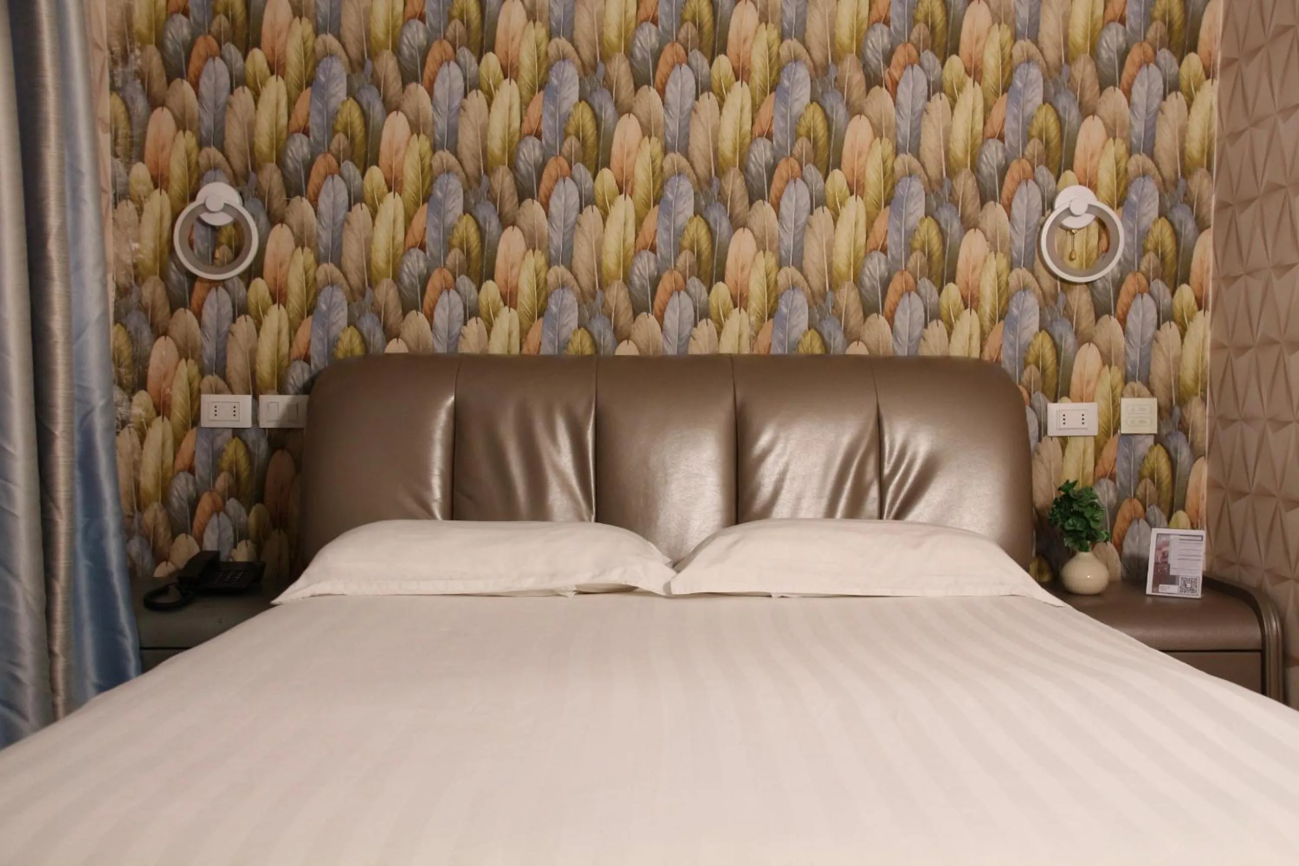 Bed in Hotel Boutique Holitel