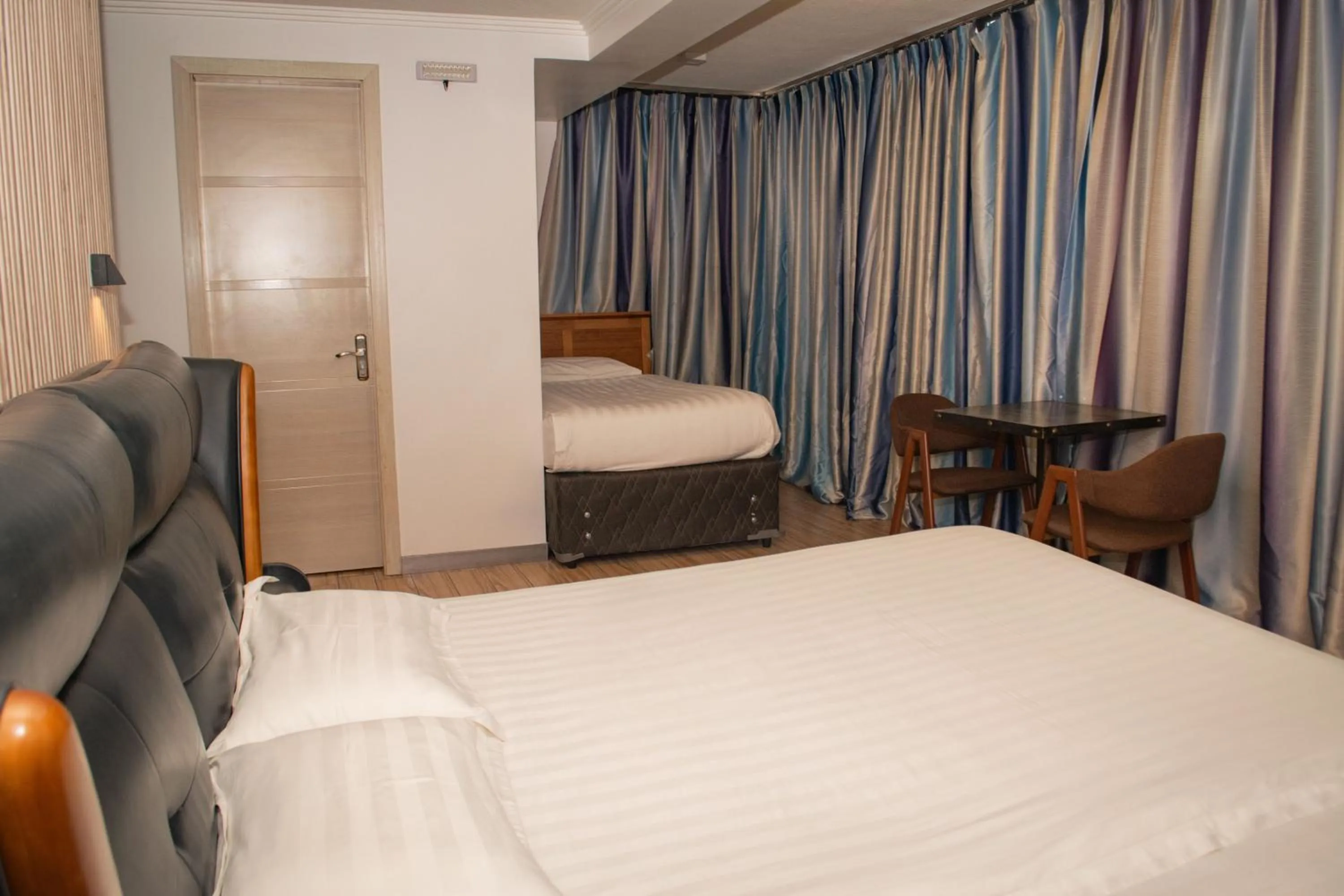 Bed in Hotel Boutique Holitel