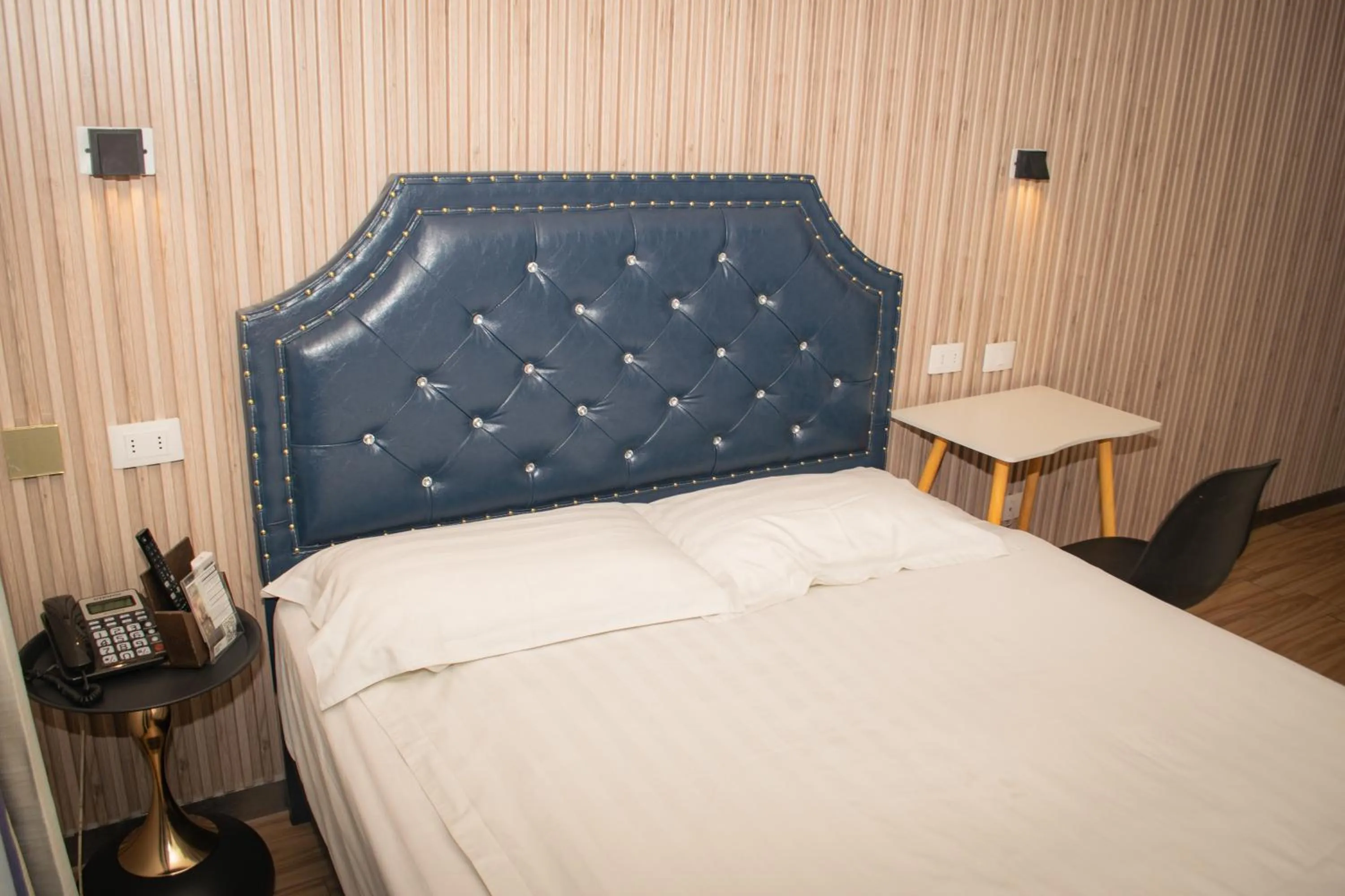 Bed in Hotel Boutique Holitel