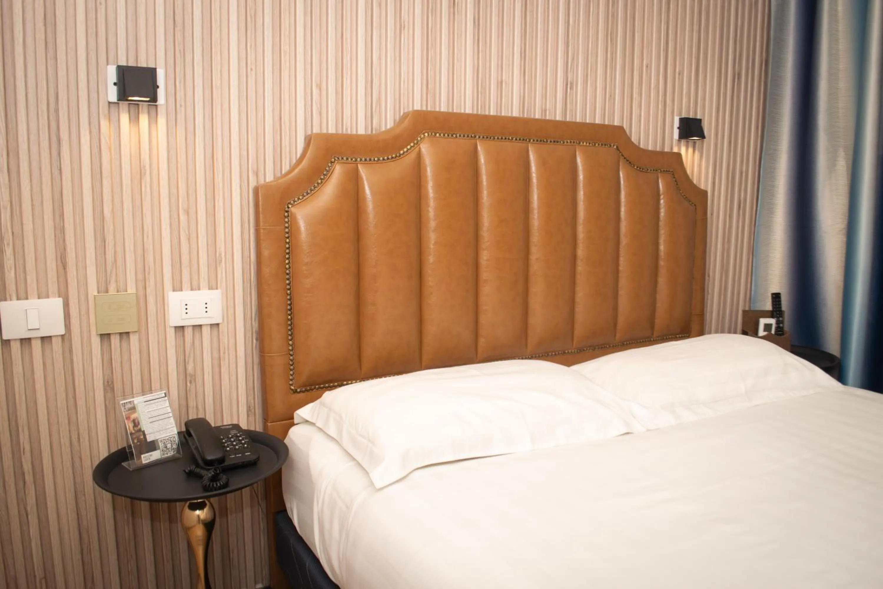 Bed in Hotel Boutique Holitel