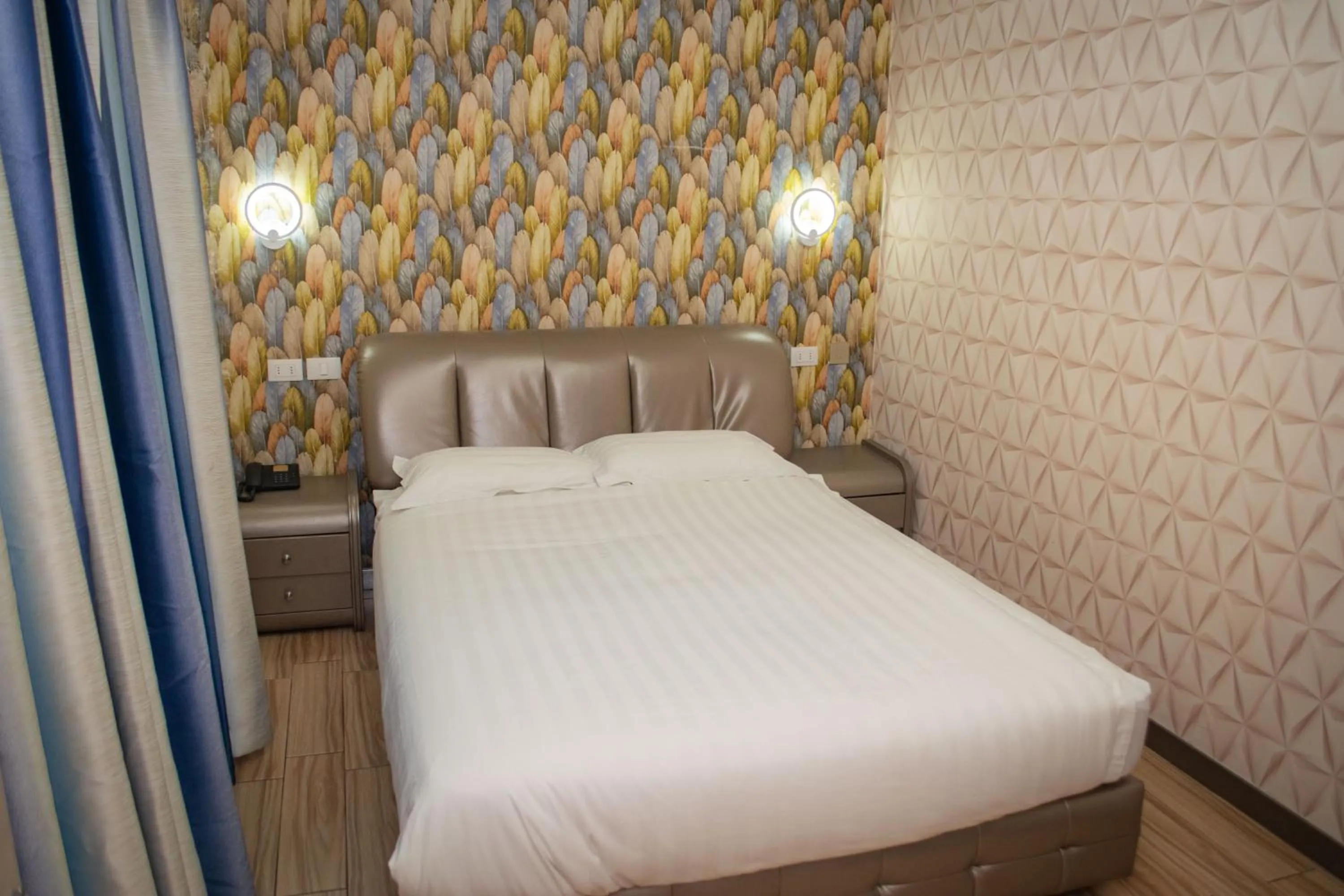 Bed in Hotel Boutique Holitel