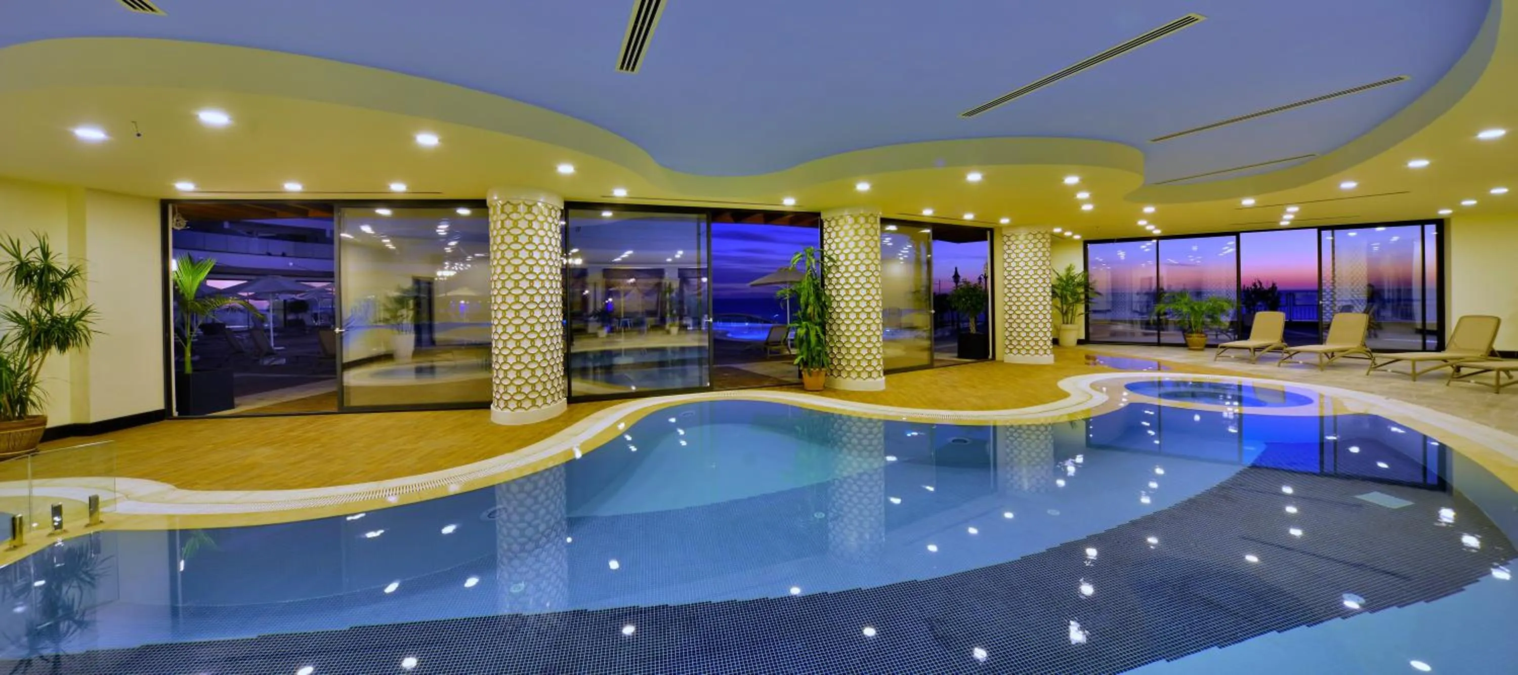 Swimming pool in Elite Luxury Suite & Spa