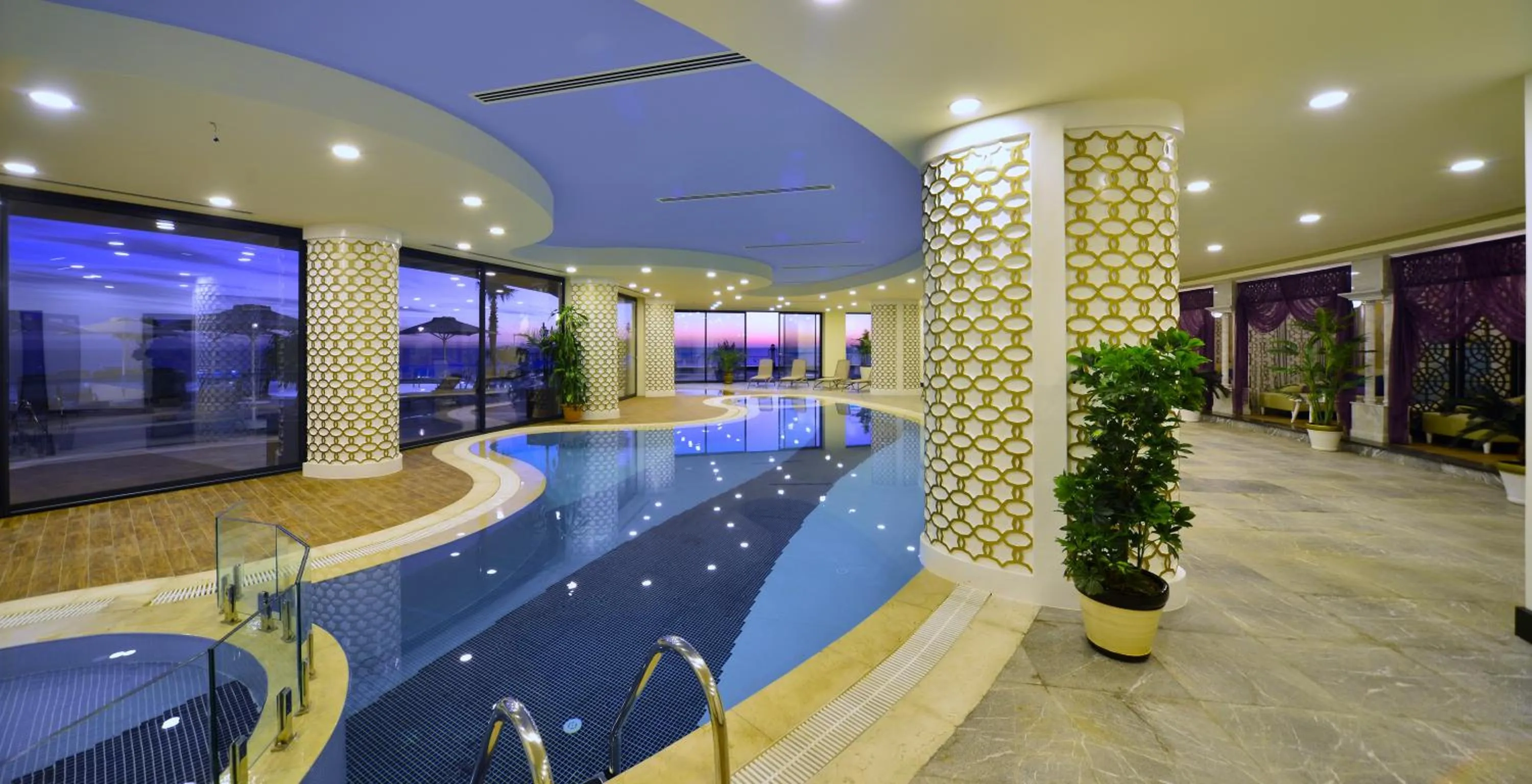 Swimming pool in Elite Luxury Suite & Spa
