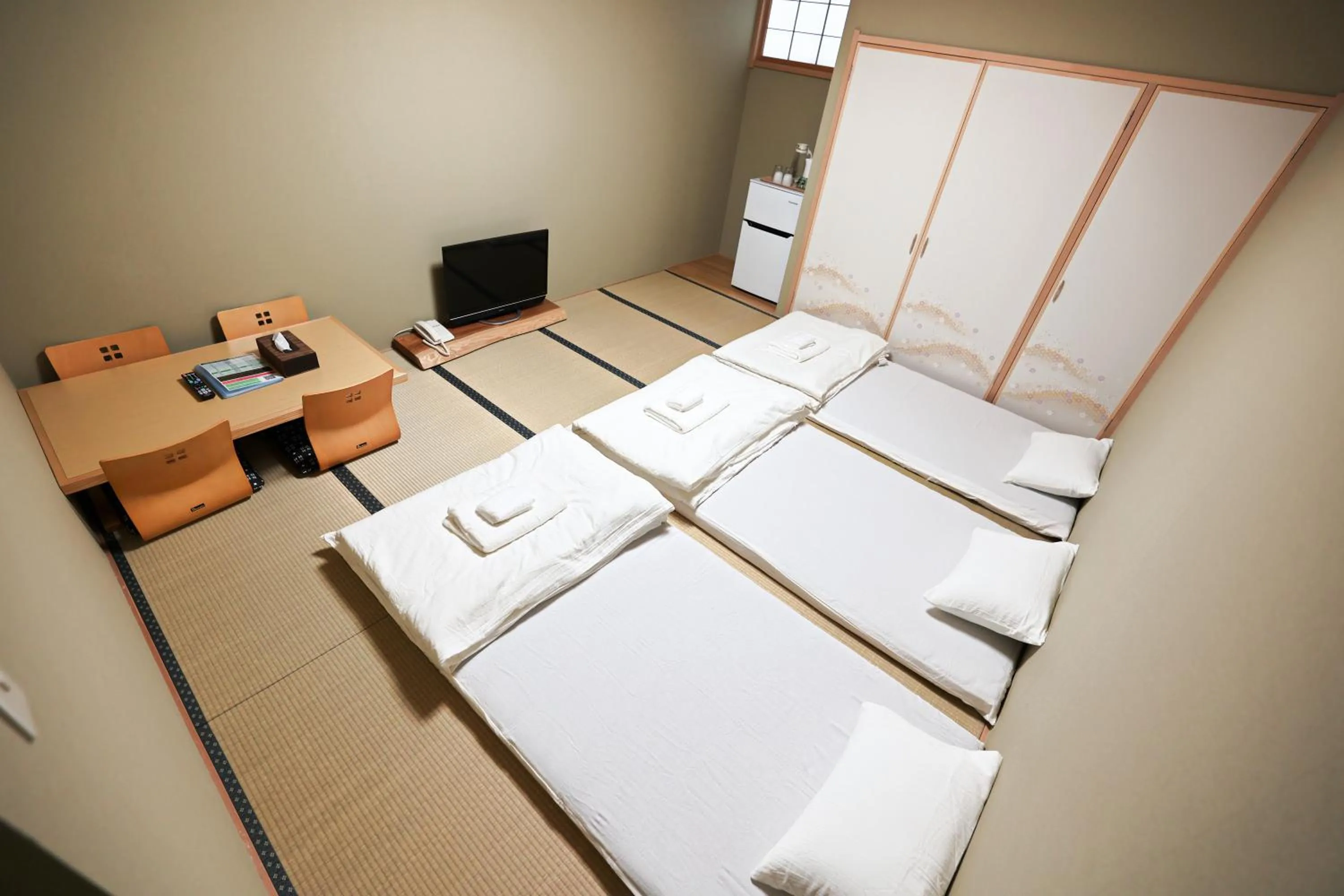 Bed in Akihabara Nakagawa Inn