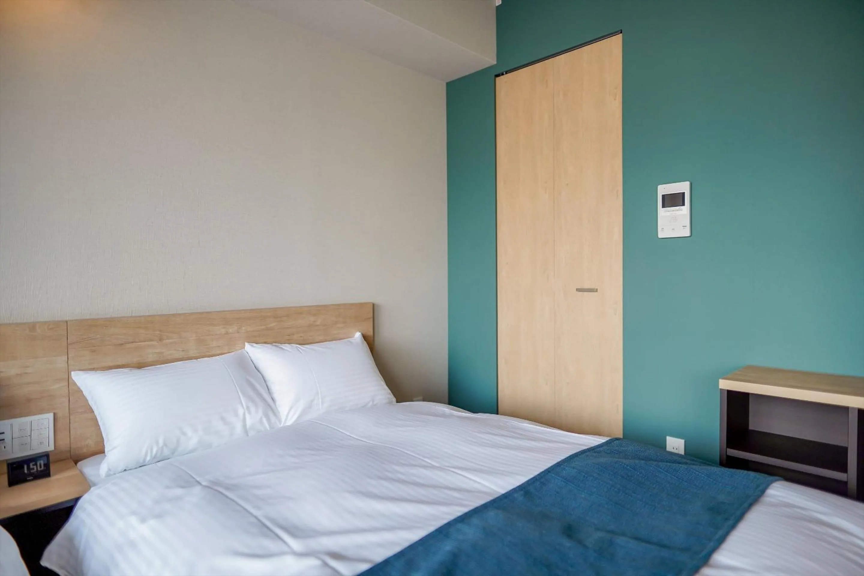 Bed in RESI STAY Heart