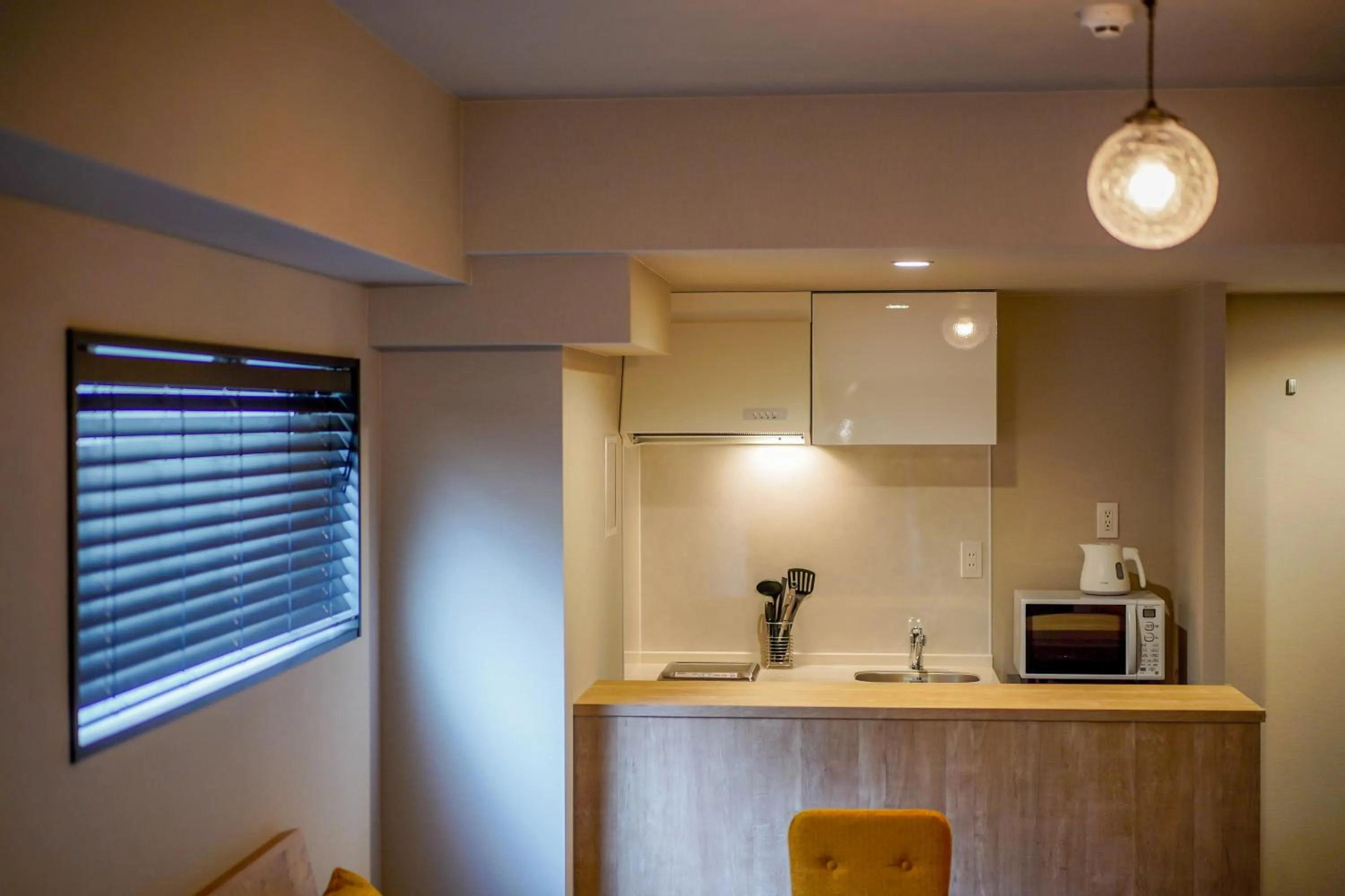 Kitchen or kitchenette in RESI STAY Heart