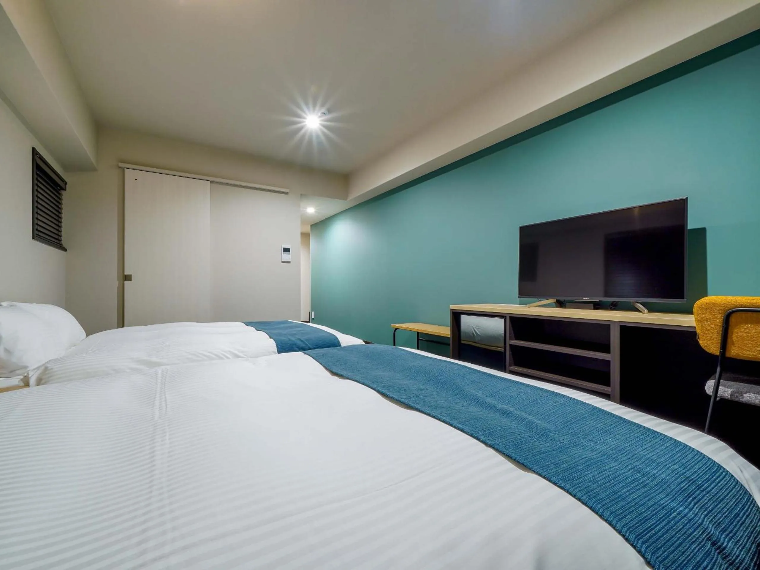 Bed in RESI STAY Heart