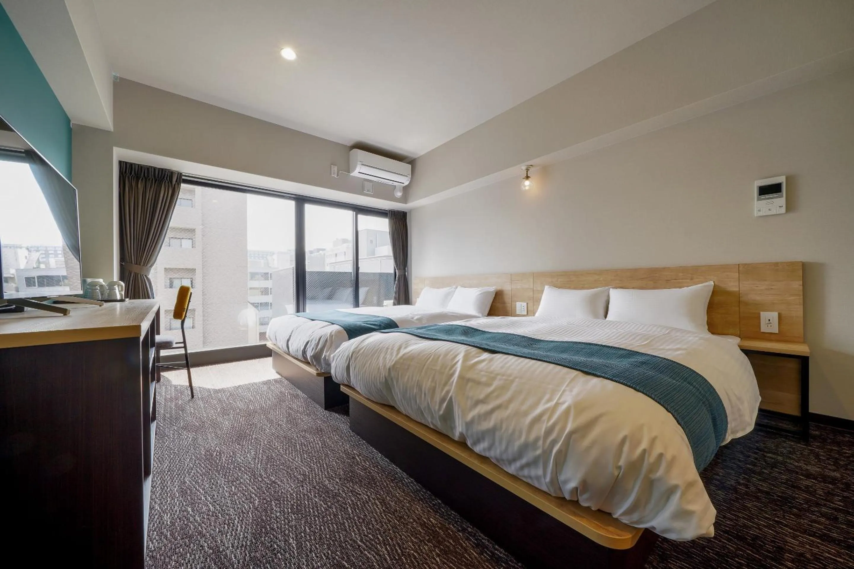 Bed in RESI STAY Heart