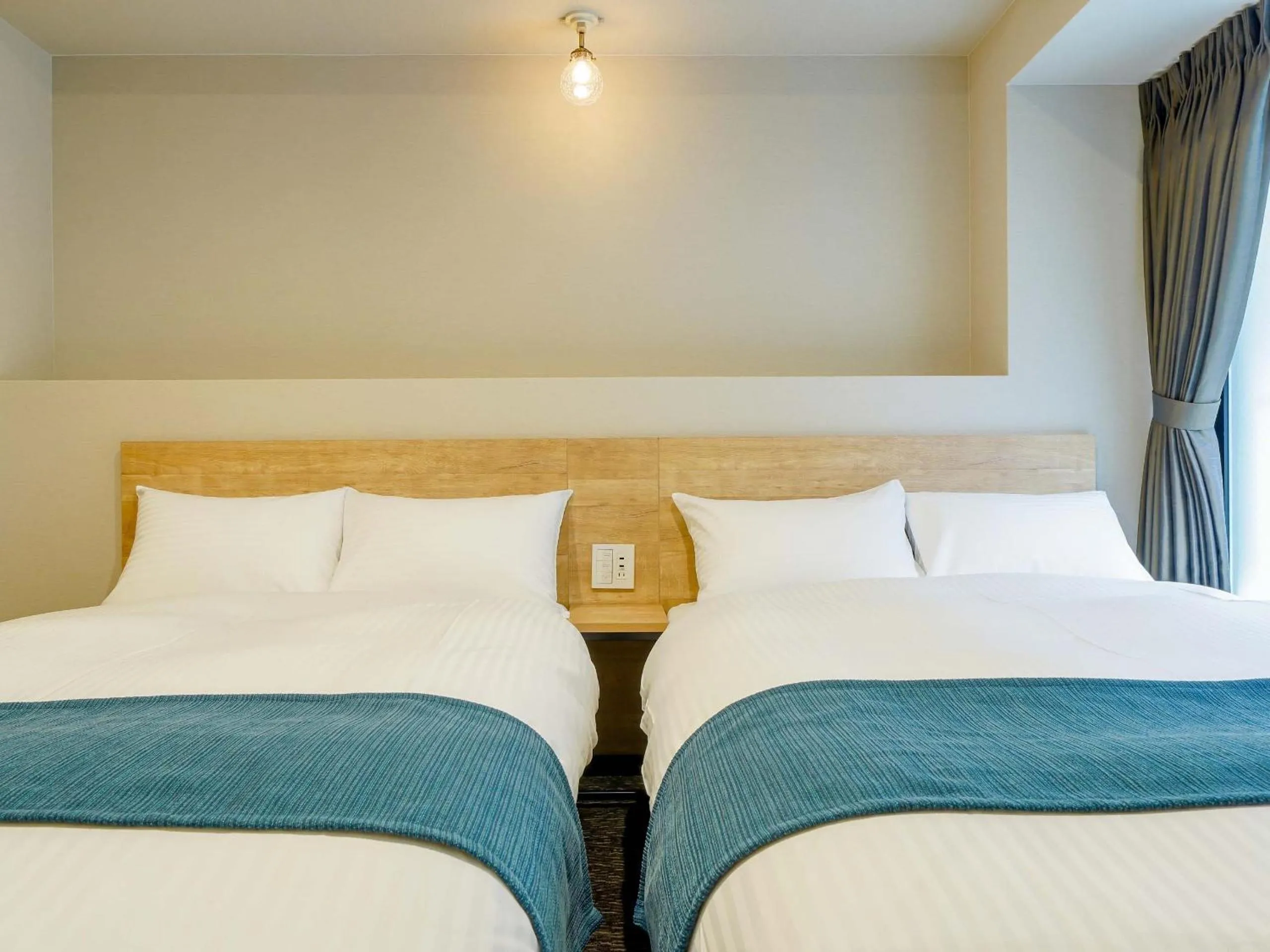 Bed in RESI STAY Heart