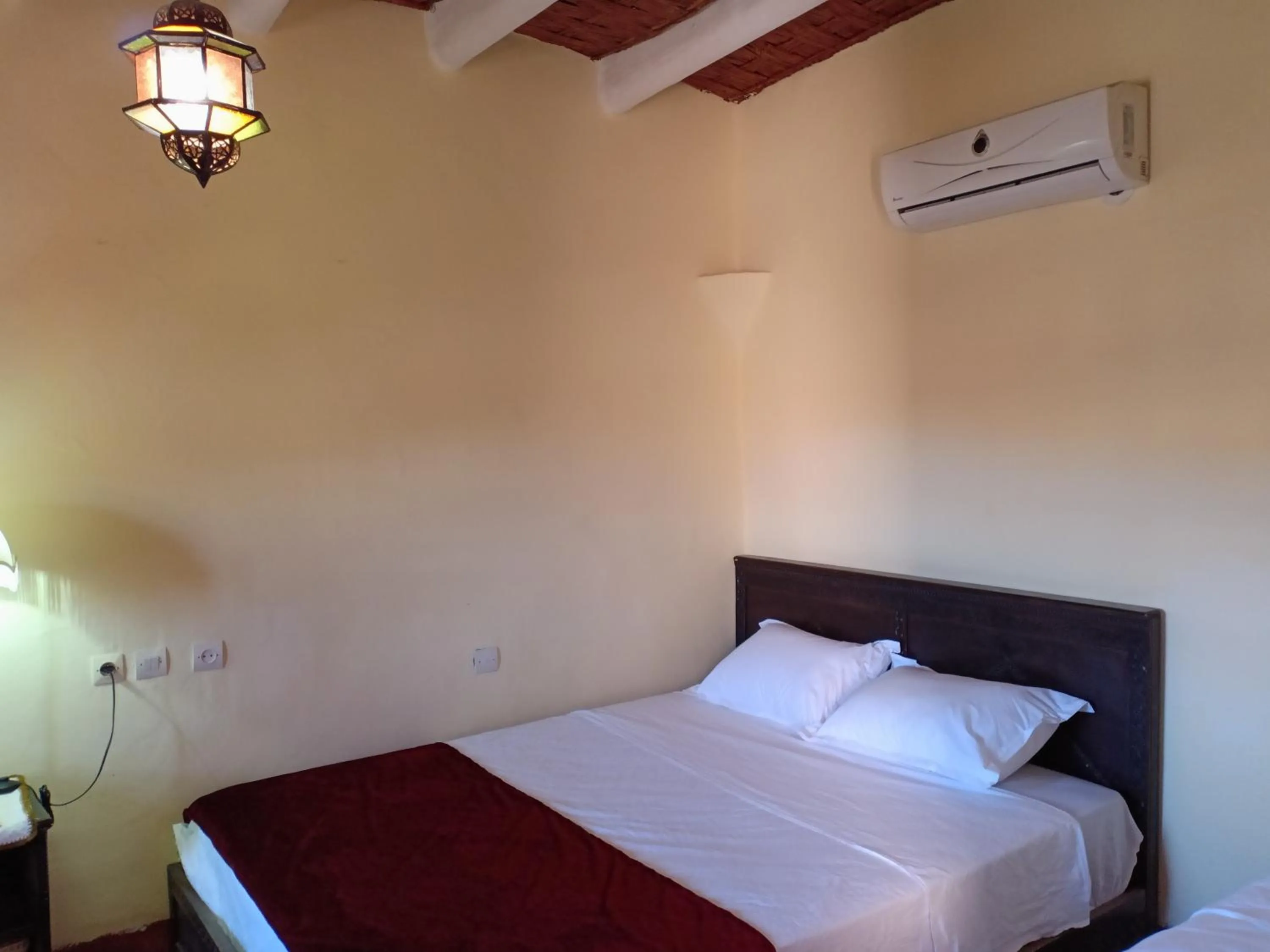 Bed in Tizi Maison d'Hôtes