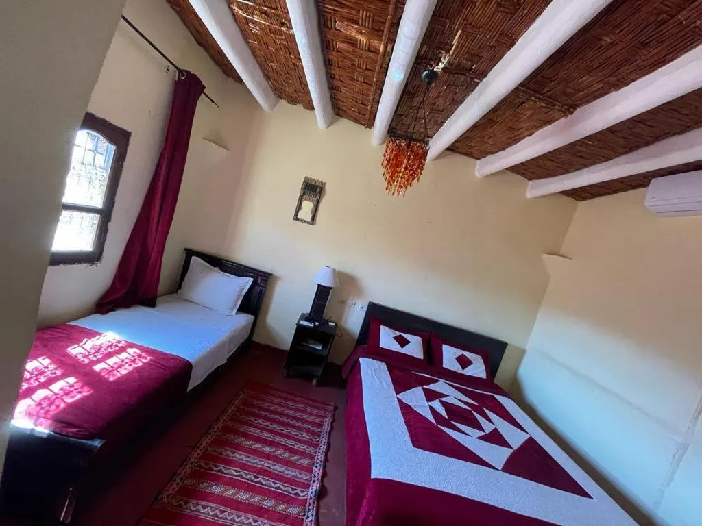Bed in Tizi Maison d'Hôtes