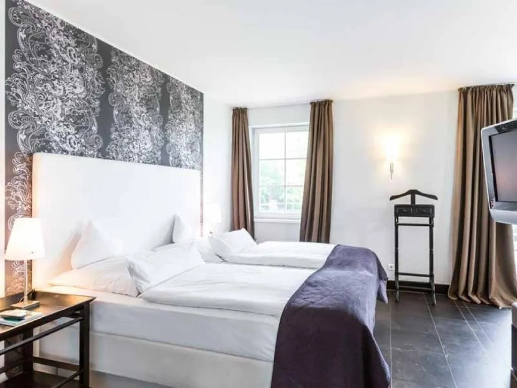 Bed in Hotel Künstlerquartier Seezeichen