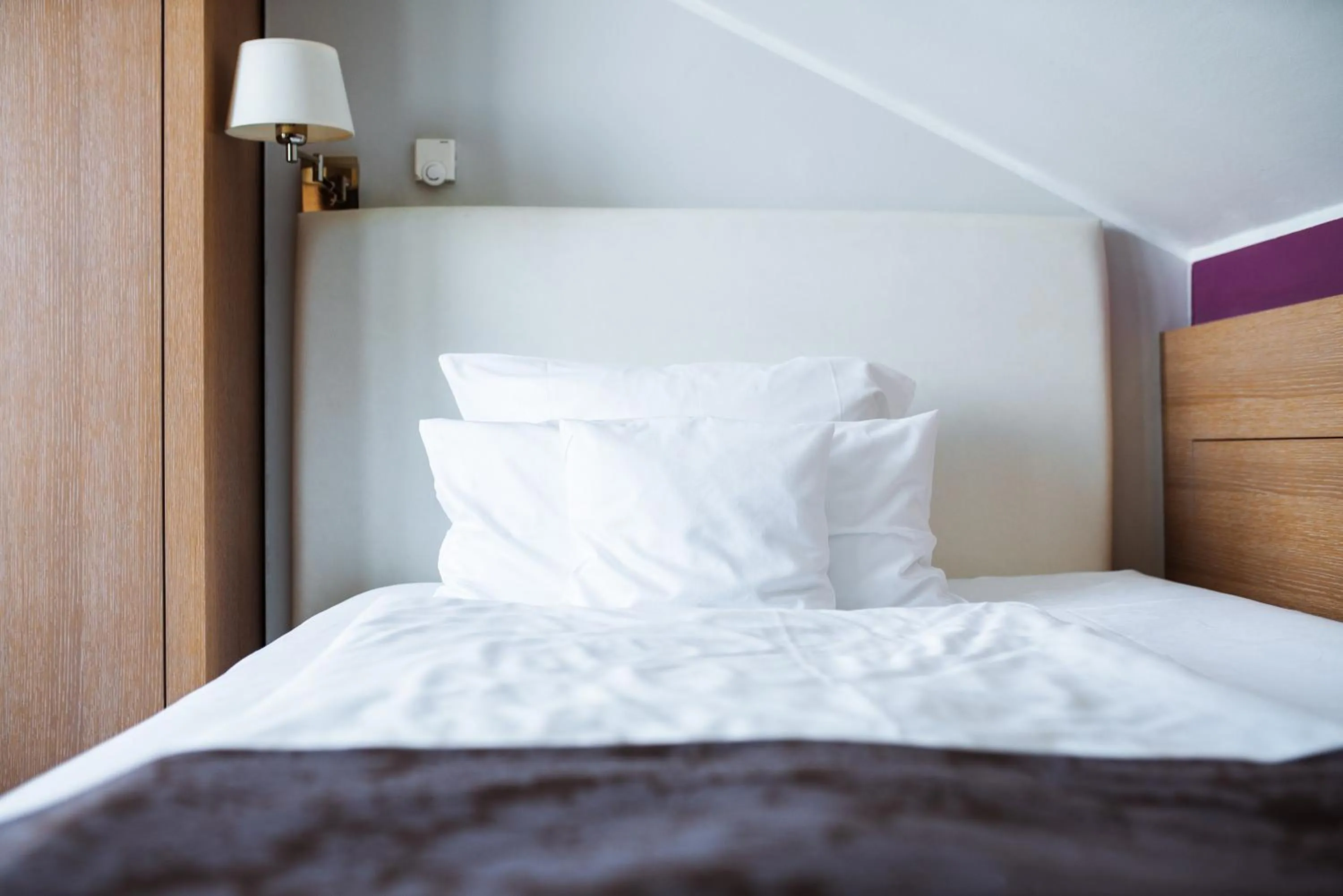 Bed in Hotel Künstlerquartier Seezeichen