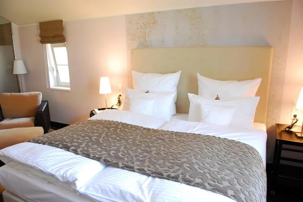 Bed in Hotel Künstlerquartier Seezeichen