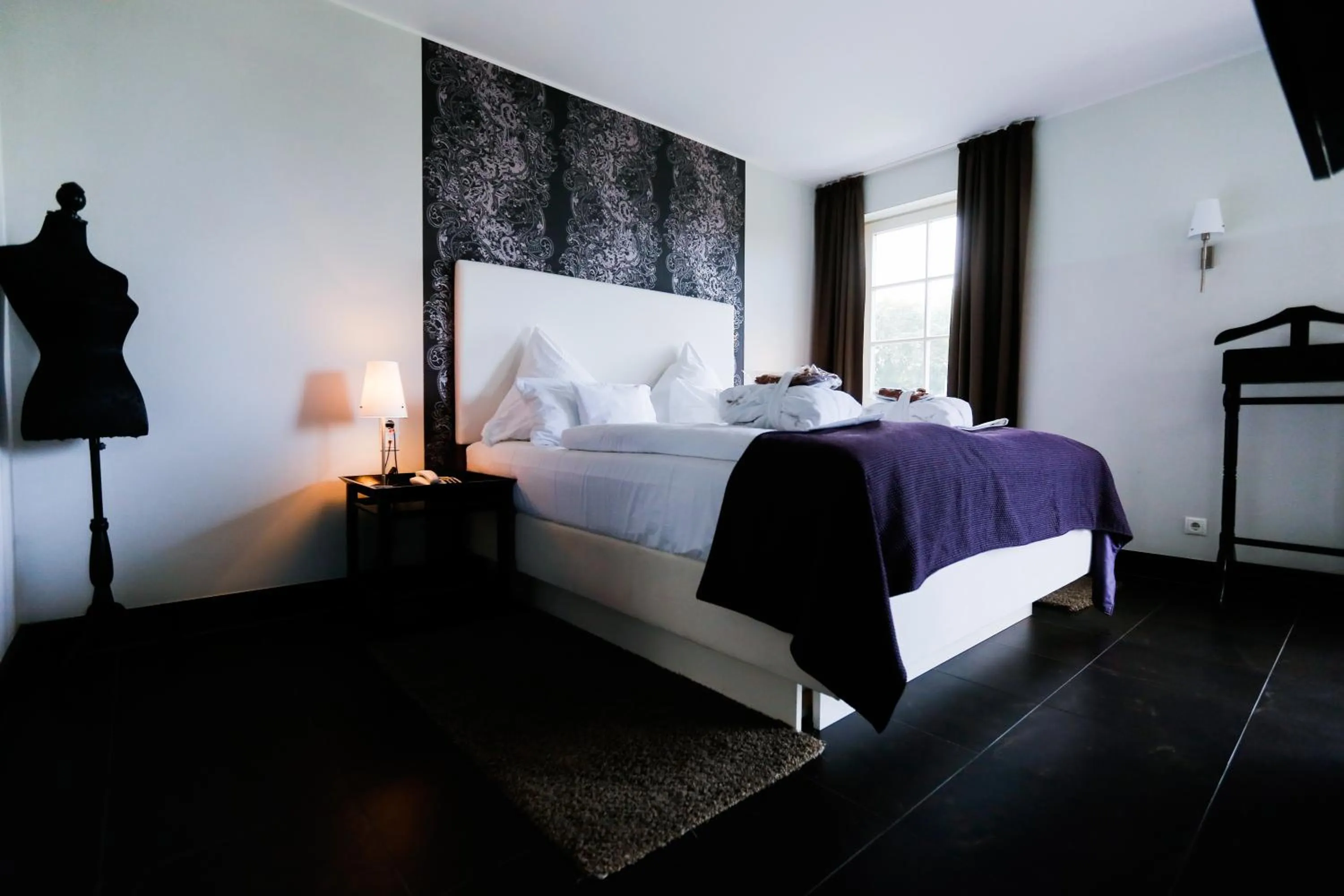 Bed in Hotel Künstlerquartier Seezeichen